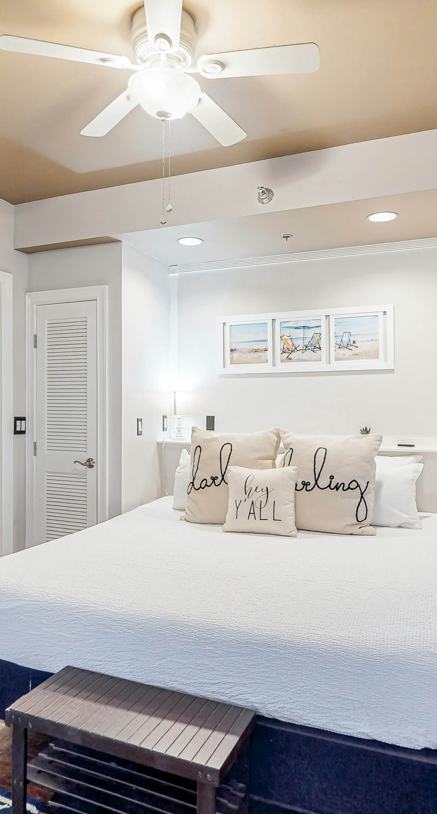 Water-view condo with on-site pool, hot tub, beachfront access, & sports courts