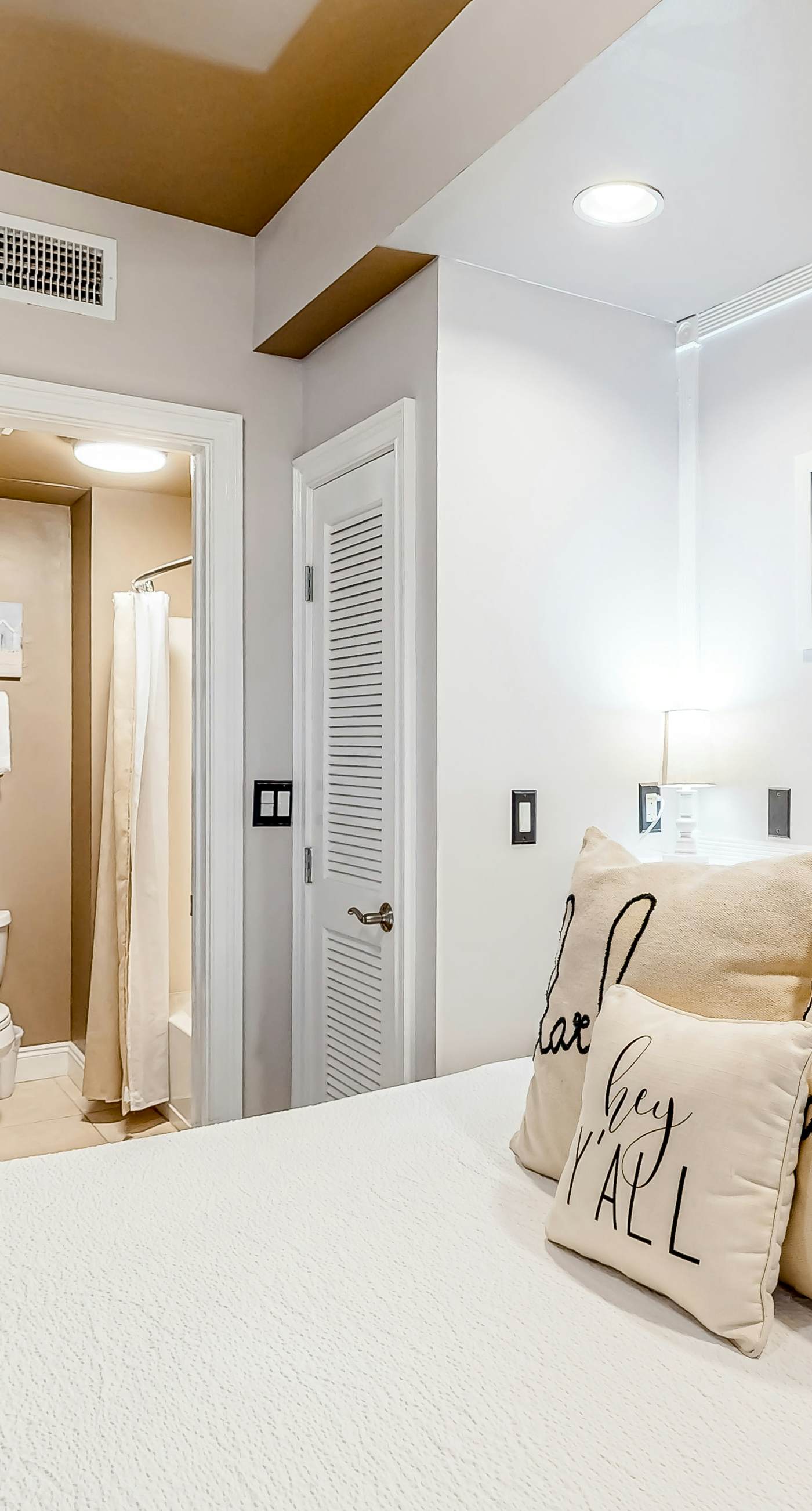 Water-view condo with on-site pool, hot tub, beachfront access, & sports courts