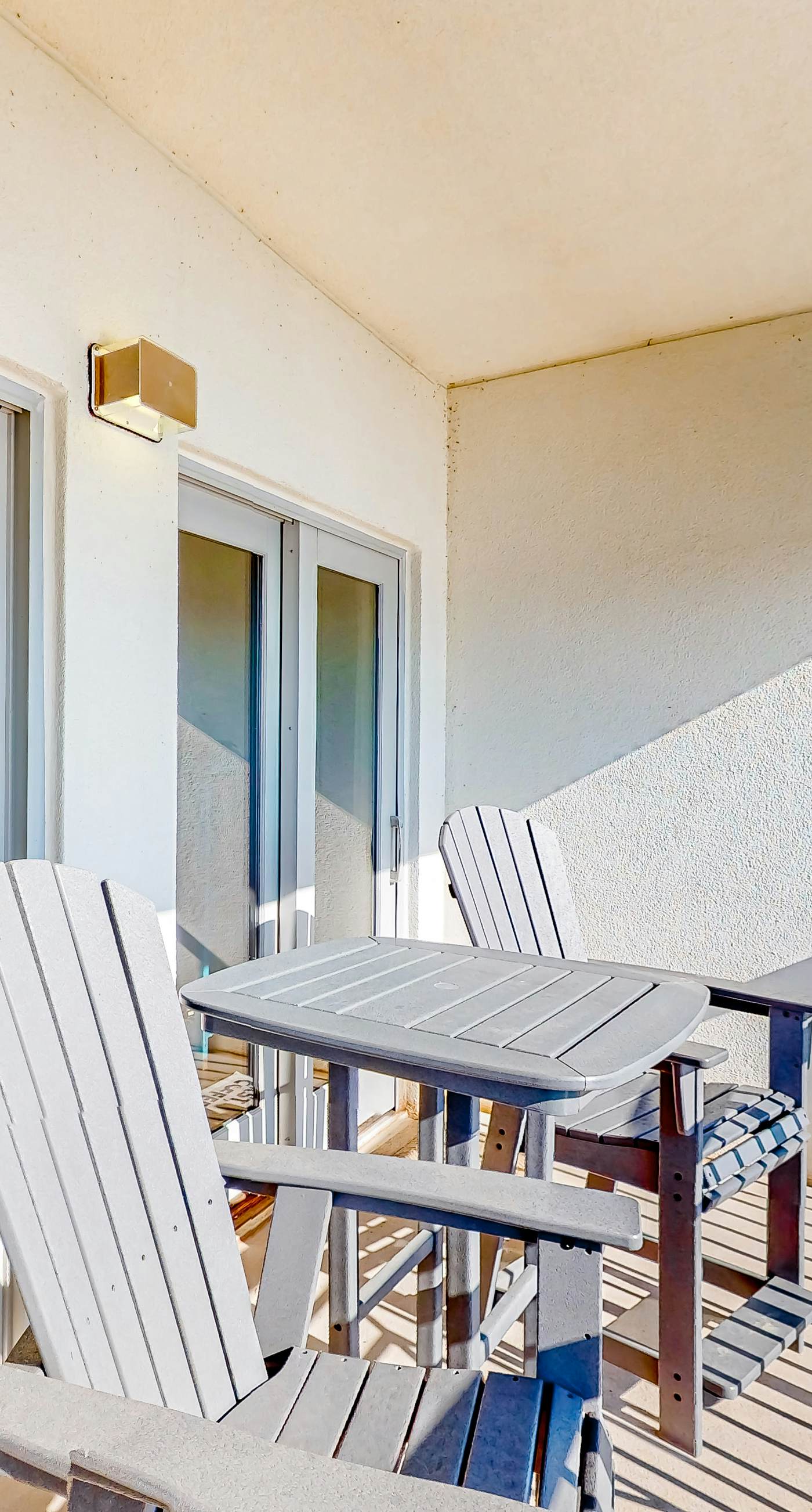 Water-view condo with on-site pool, hot tub, beachfront access, & sports courts