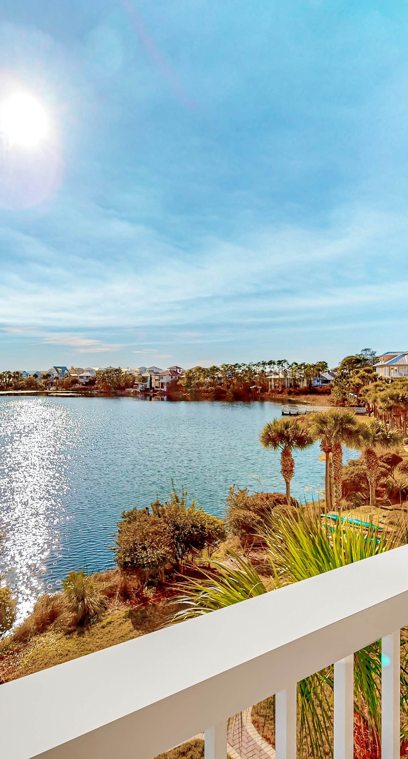 Water-view condo with on-site pool, hot tub, beachfront access, & sports courts