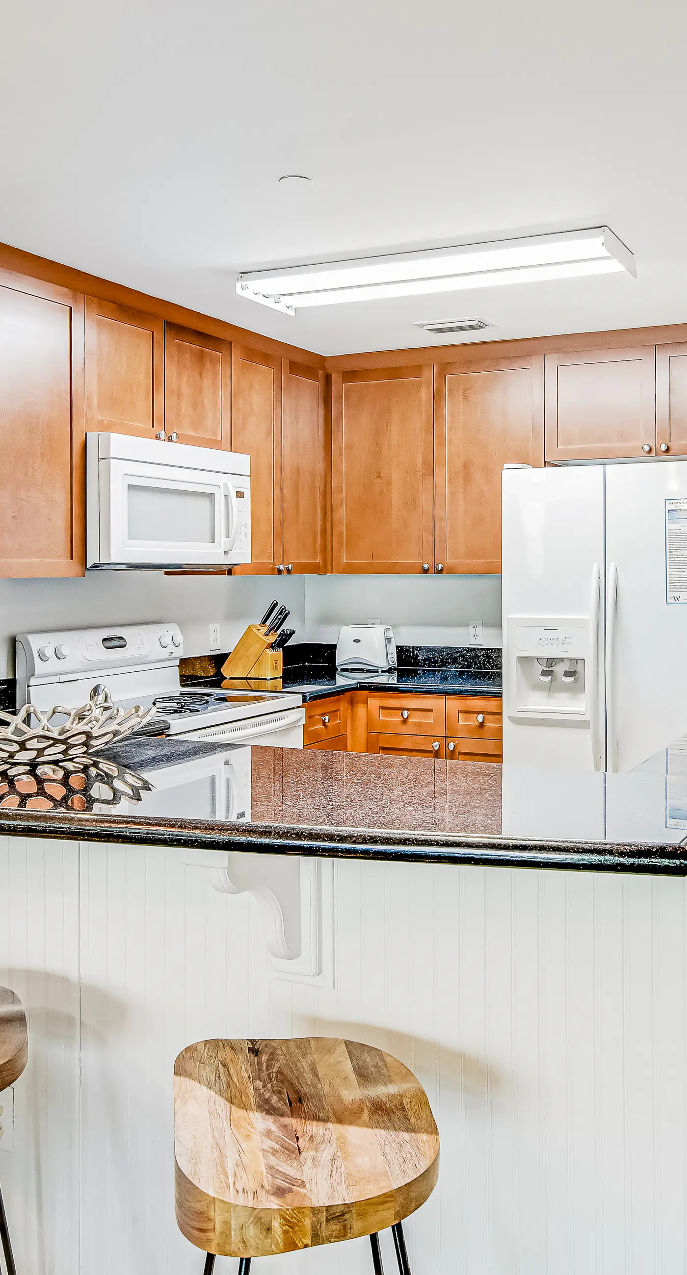 Renovated oceanfront condo with pools, hot tub & AC