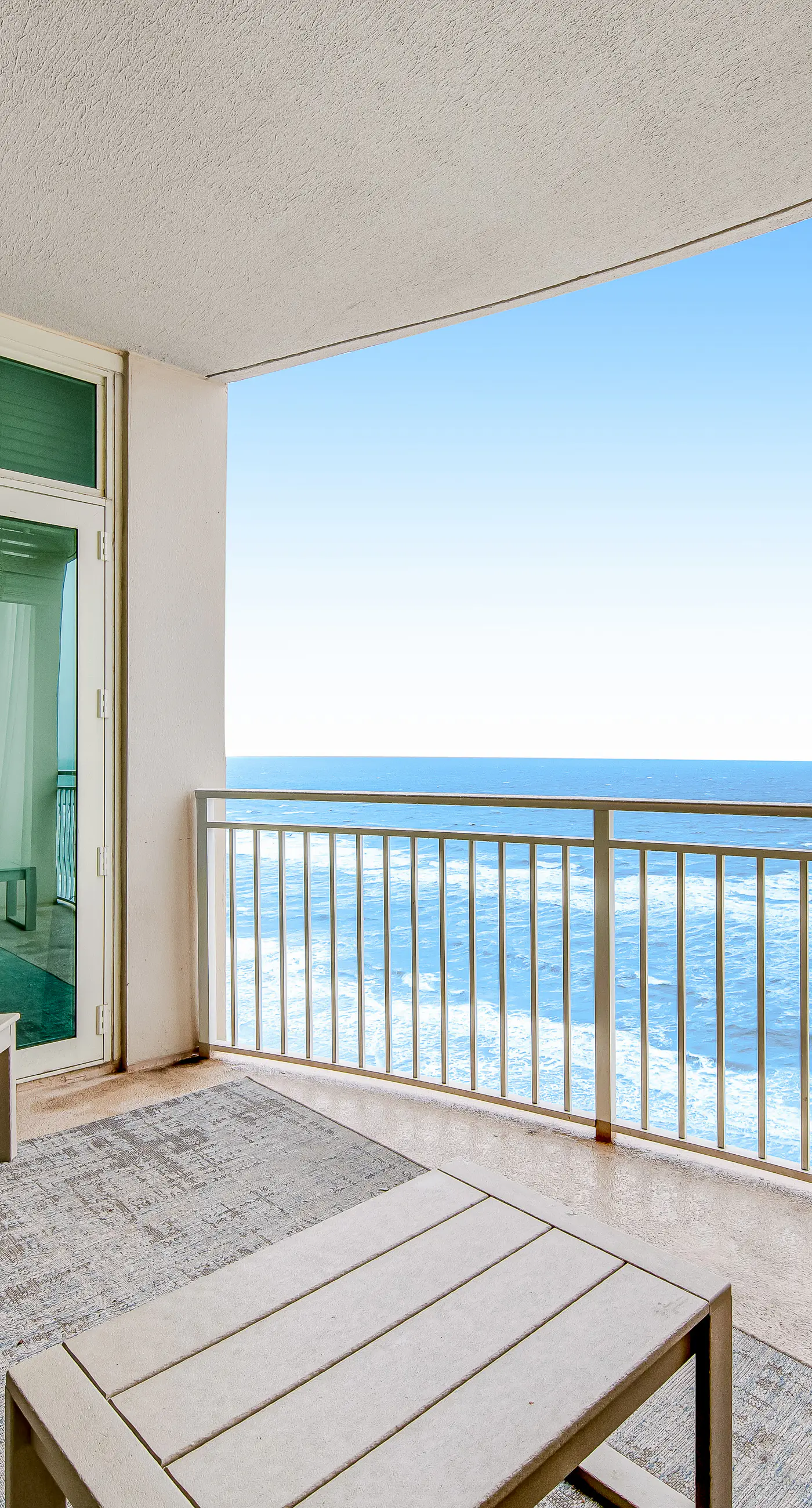 Renovated oceanfront condo with pools, hot tub & AC