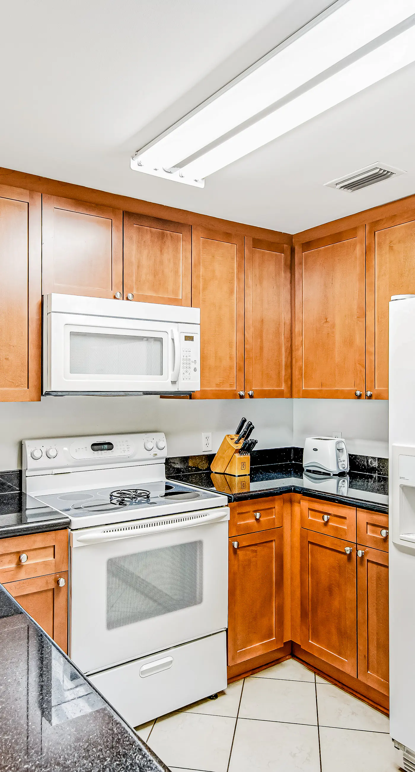 Renovated oceanfront condo with pools, hot tub & AC