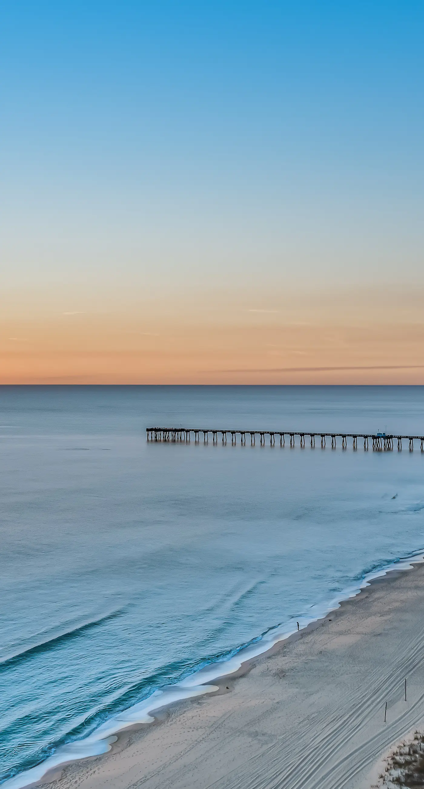 Renovated oceanfront condo with pools, hot tub & AC