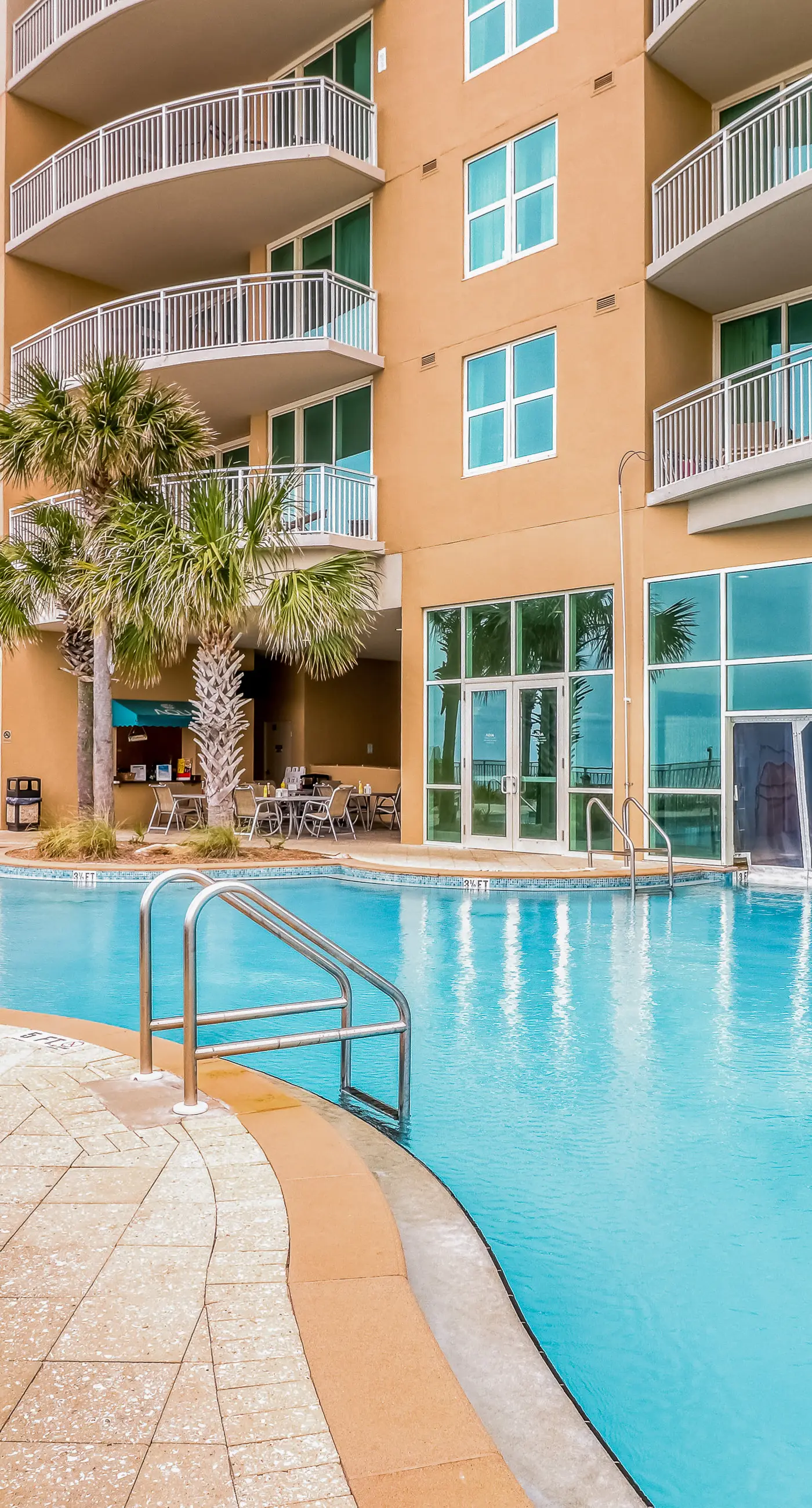 Updated, beachfront condo with pool, hot tub & gym