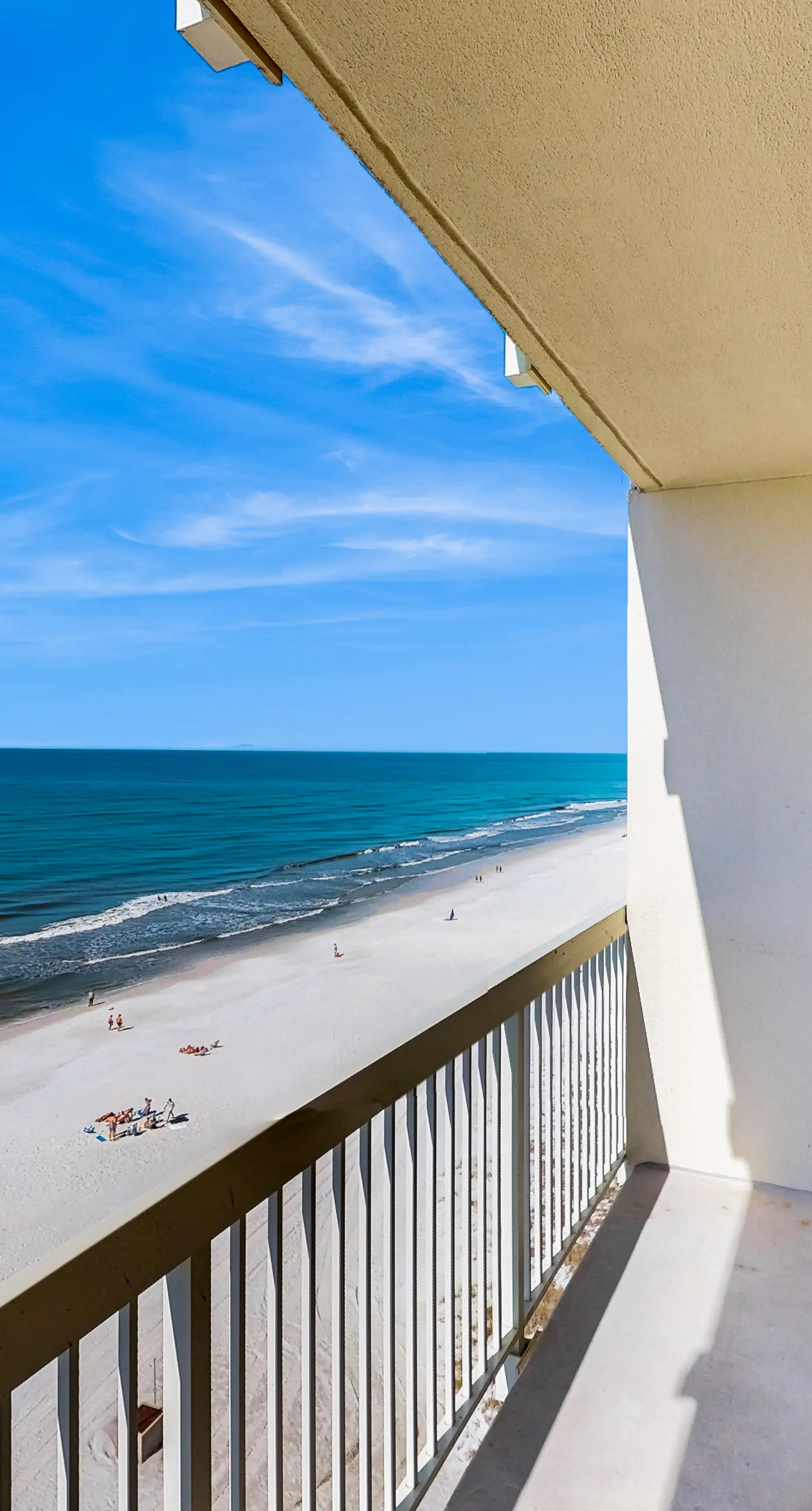 Colorful oceanfront condo with Gulf views, on-site pools & hot tub