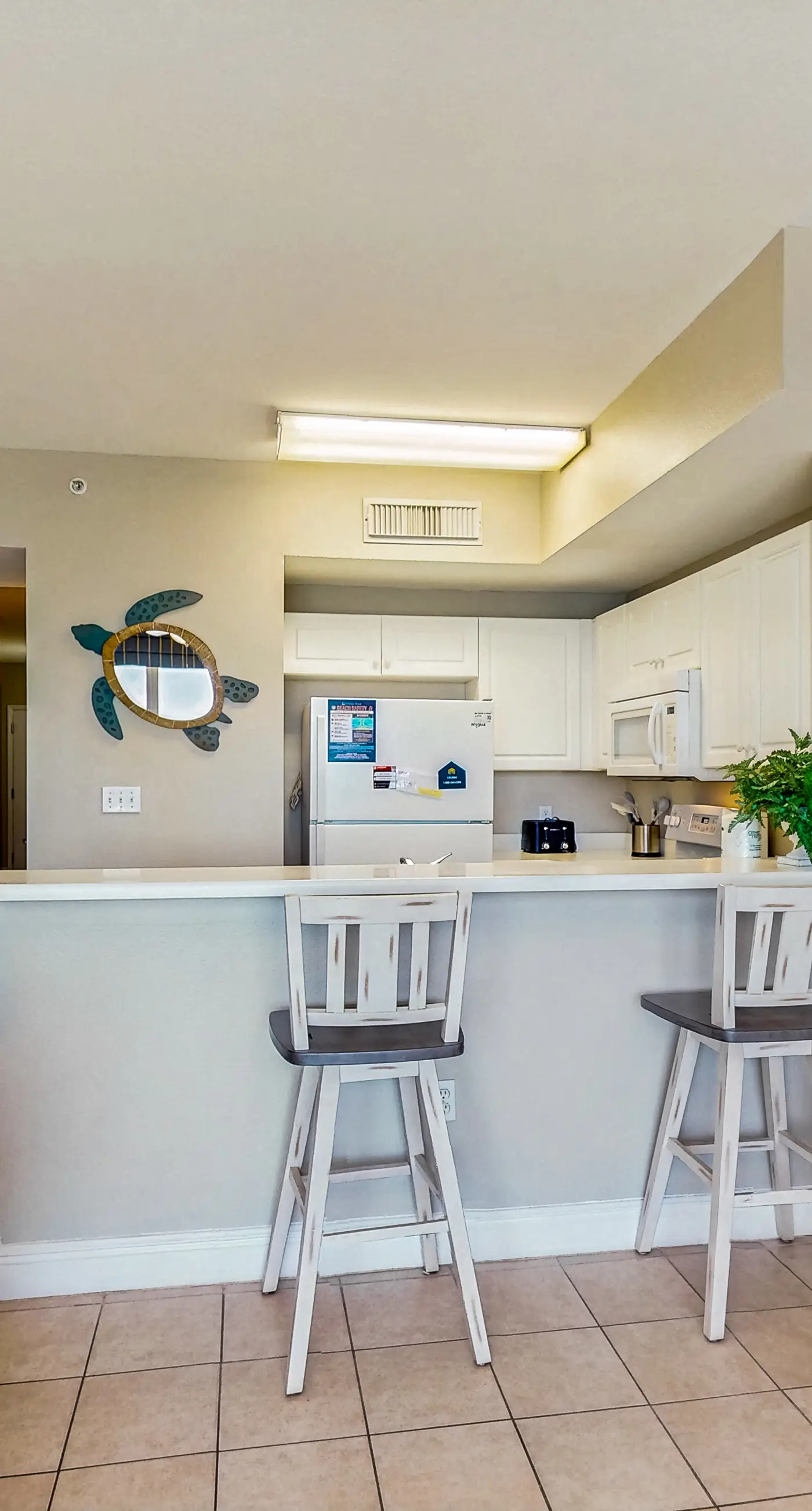 Colorful oceanfront condo with Gulf views, on-site pools & hot tub