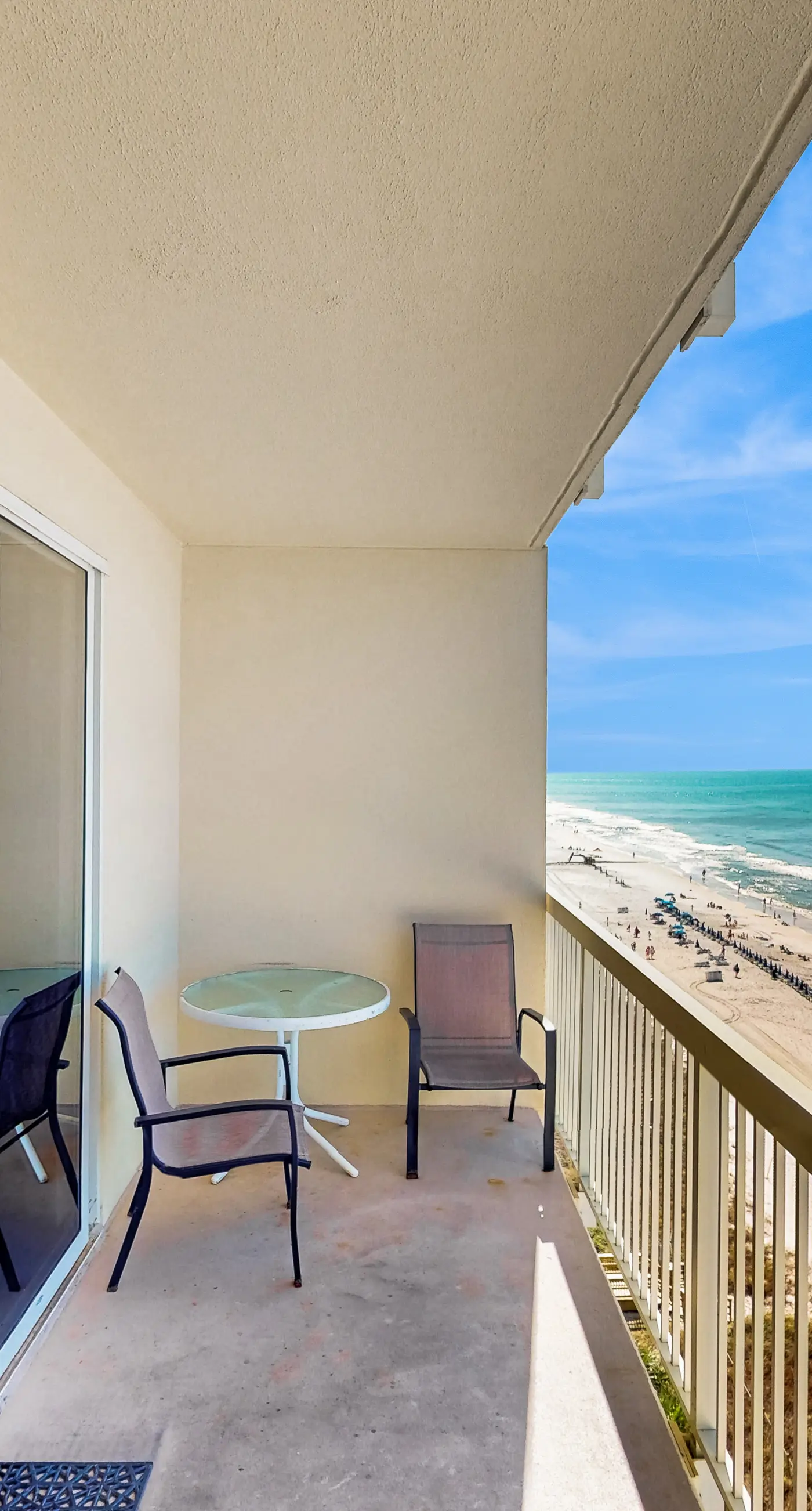 Colorful oceanfront condo with Gulf views, on-site pools & hot tub