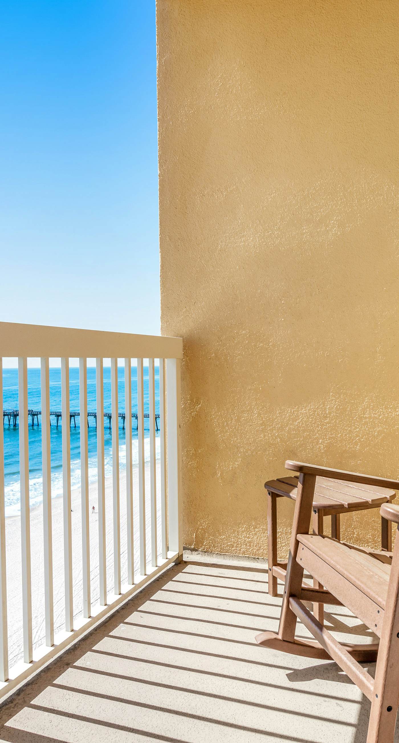 High-rise condo with pool & ocean views - walk to the beach