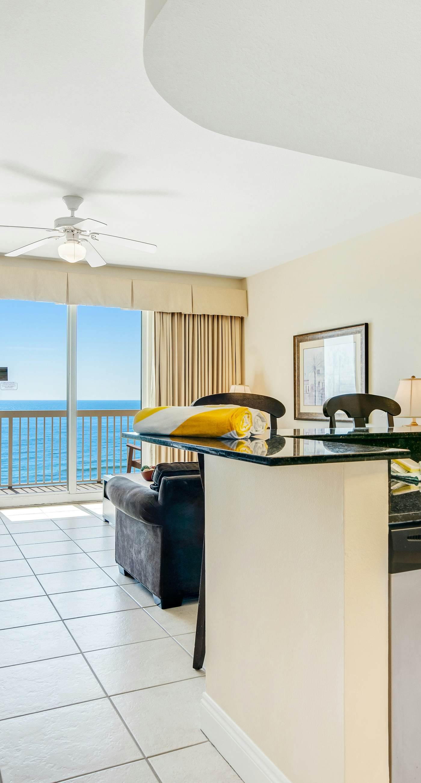 High-rise condo with pool & ocean views - walk to the beach