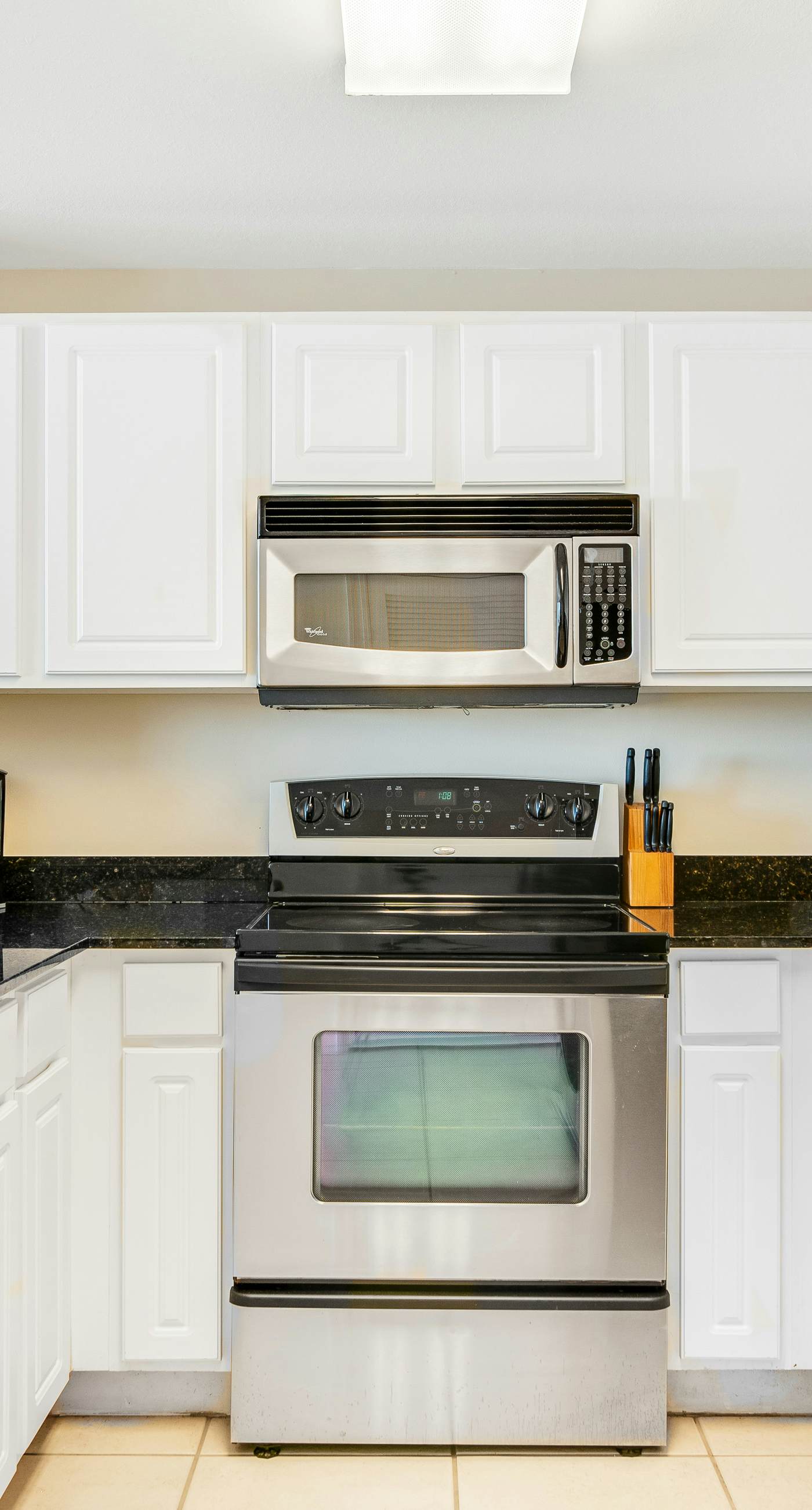 High-rise condo with pool & ocean views - walk to the beach