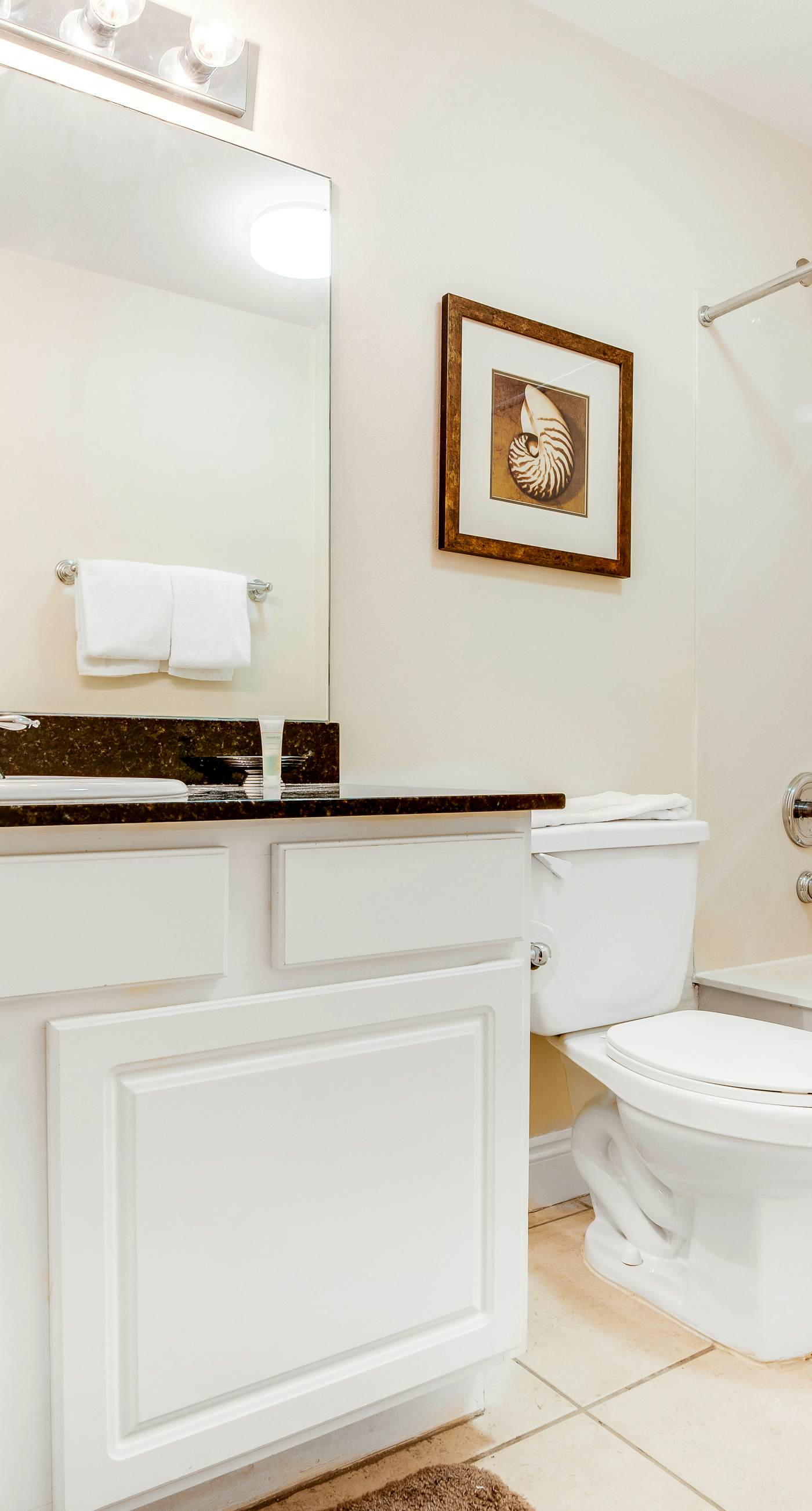 High-rise condo with pool & ocean views - walk to the beach