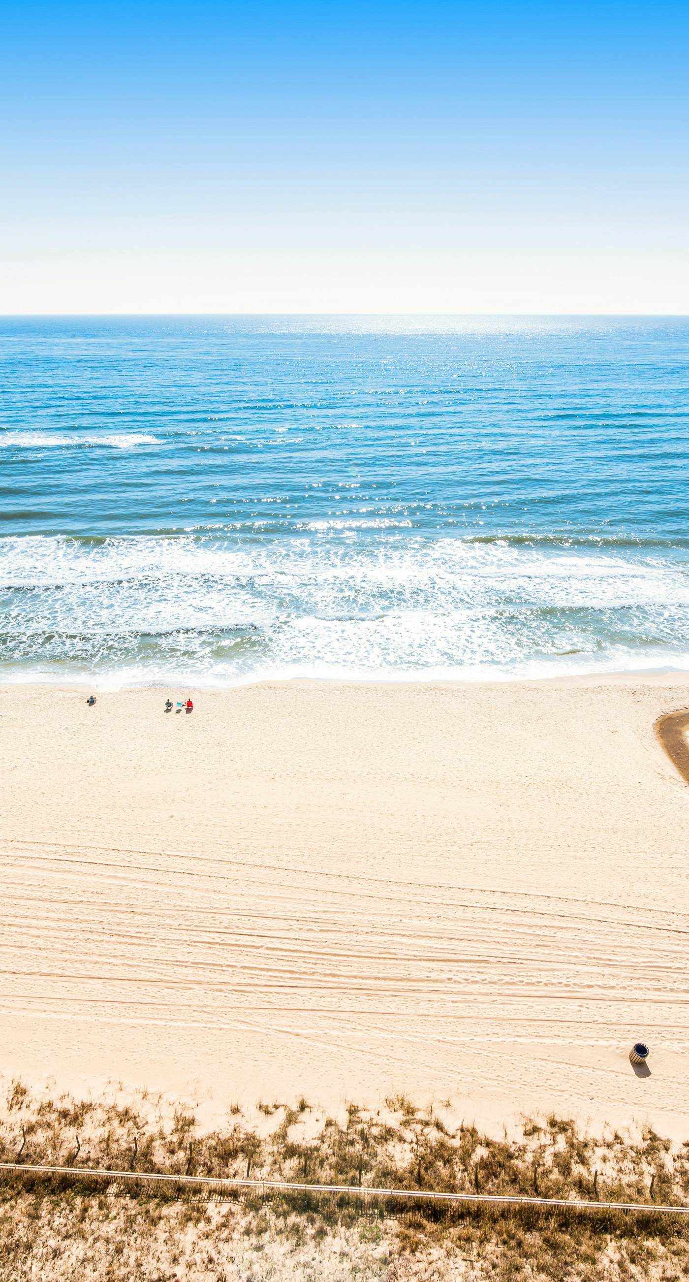 High-rise condo with pool & ocean views - walk to the beach