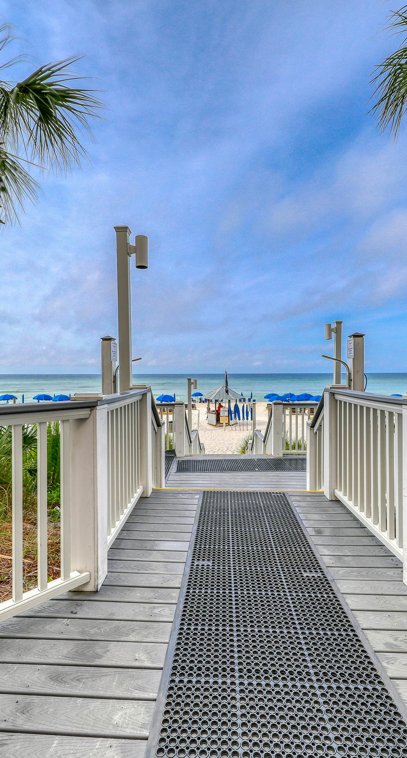 High-rise condo with pool & ocean views - walk to the beach