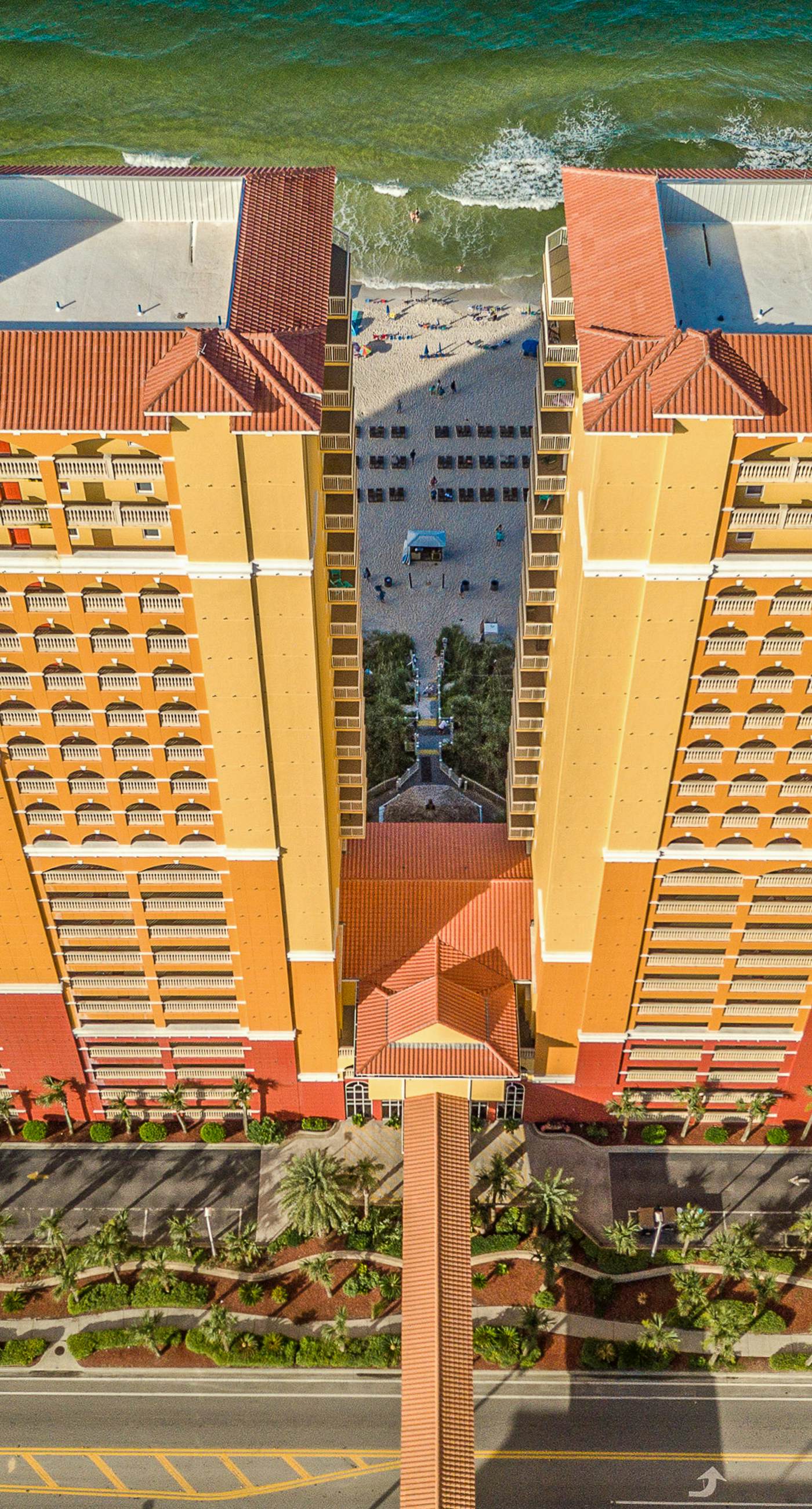 Ocean-view 10th-floor condo with balcony, heated outdoor pool, hot tub, gym, W&D