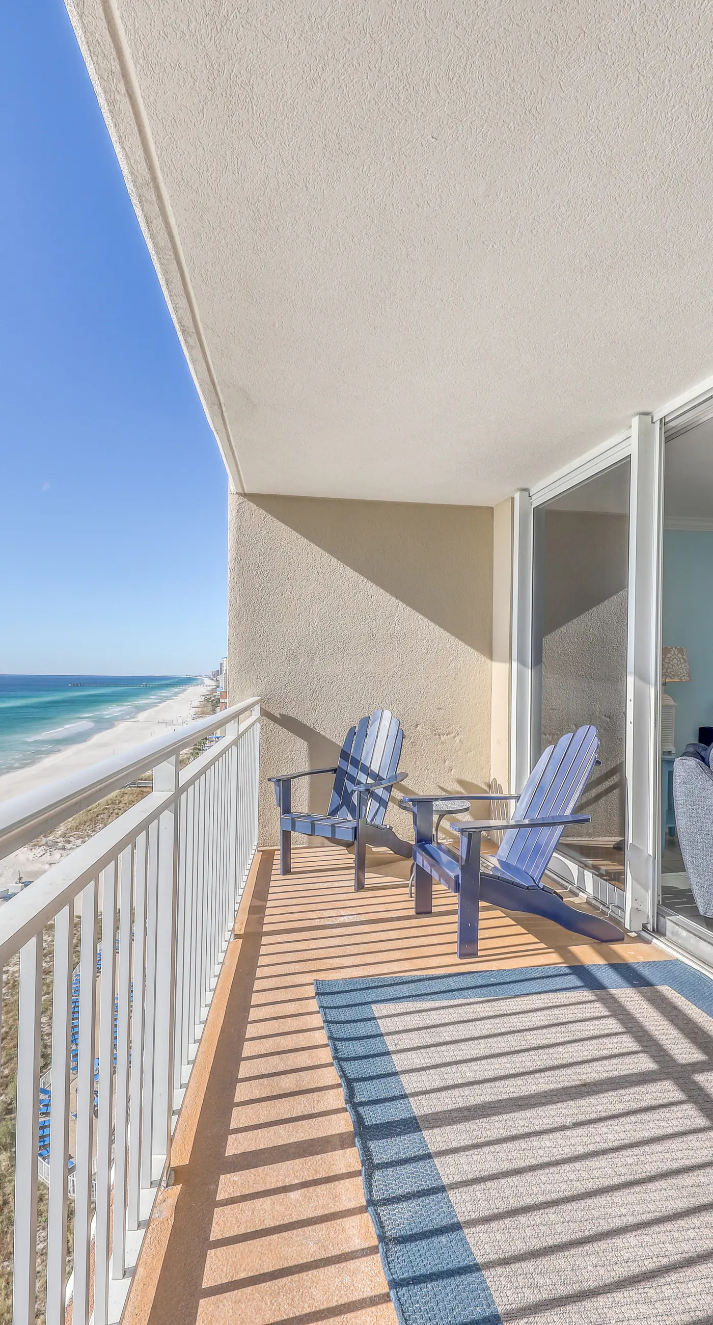 Light-filled beachfront condo with shared pool, hot tub & beach access