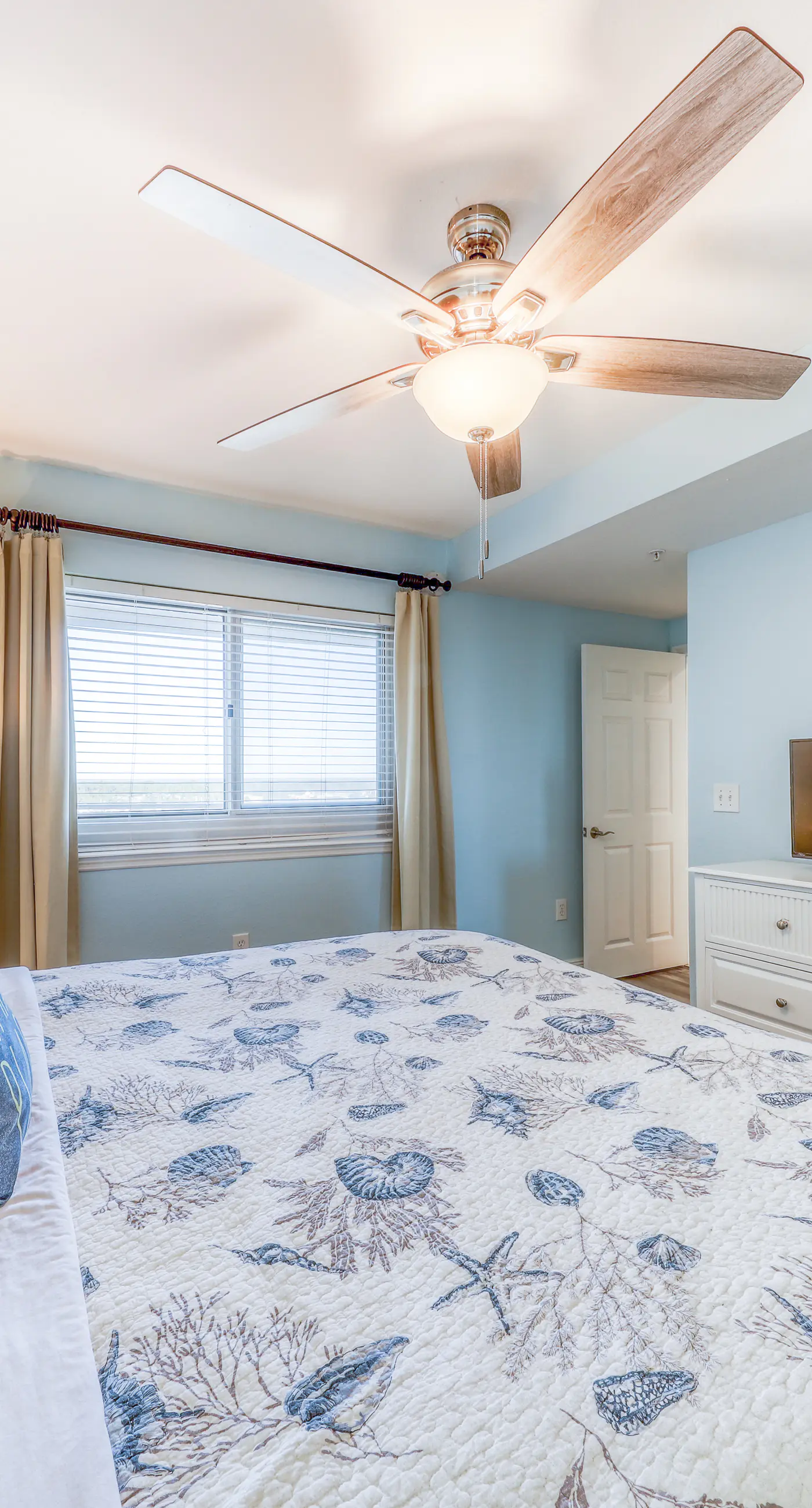 Light-filled beachfront condo with shared pool, hot tub & beach access