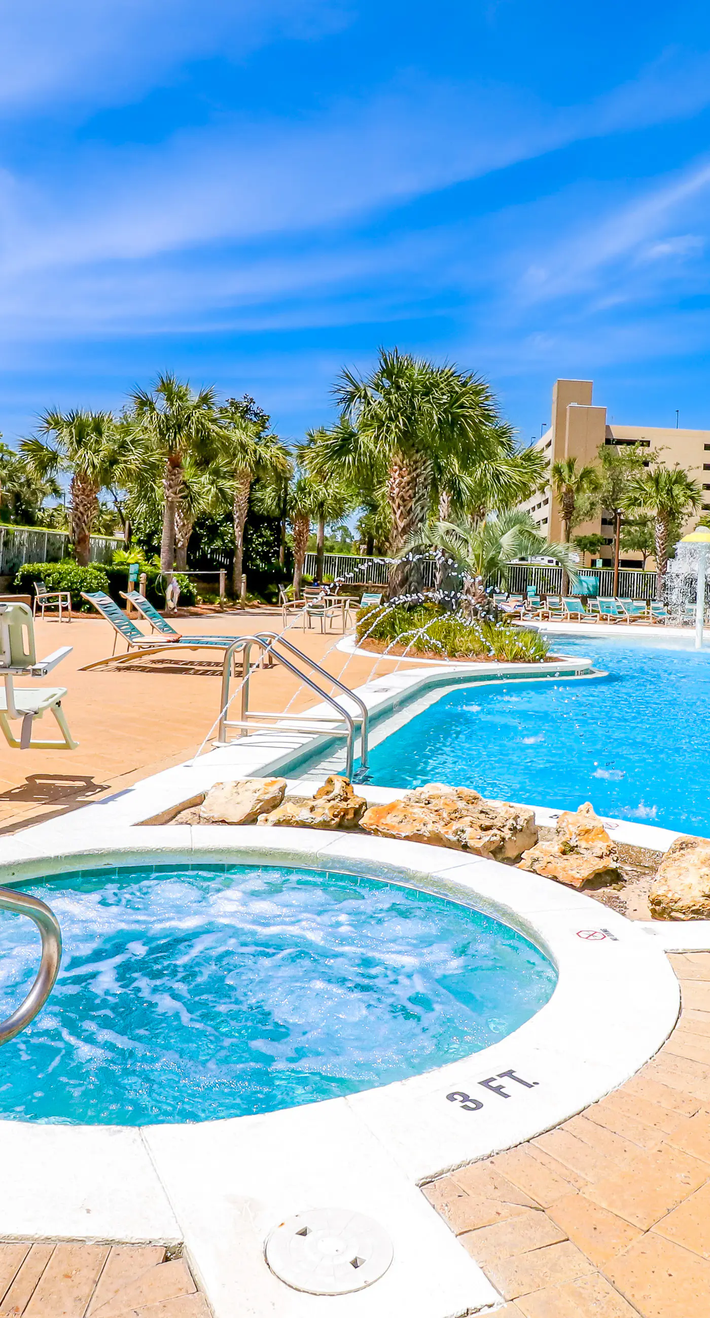 Light-filled beachfront condo with shared pool, hot tub & beach access
