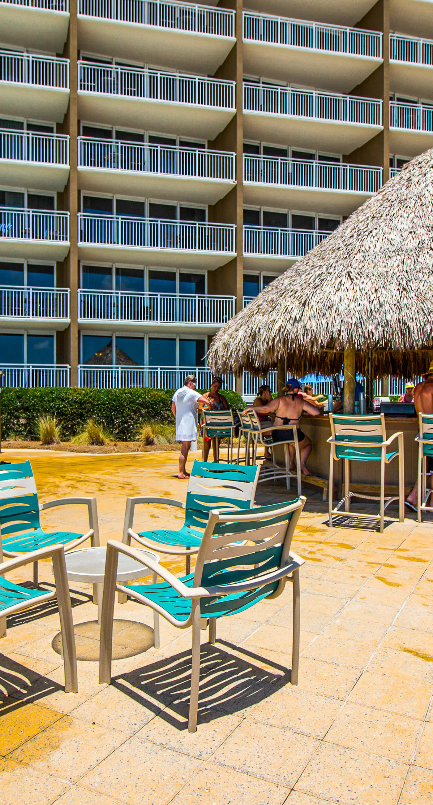 Light-filled beachfront condo with shared pool, hot tub & beach access