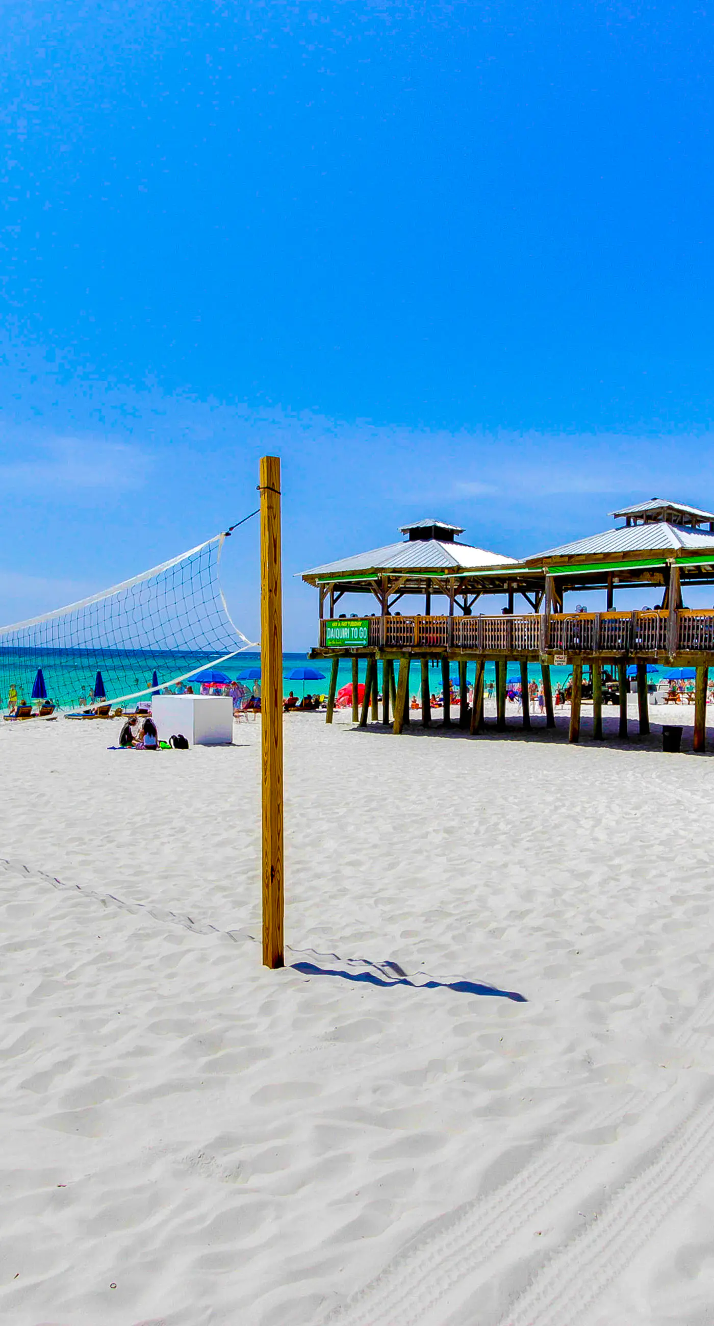 Light-filled beachfront condo with shared pool, hot tub & beach access