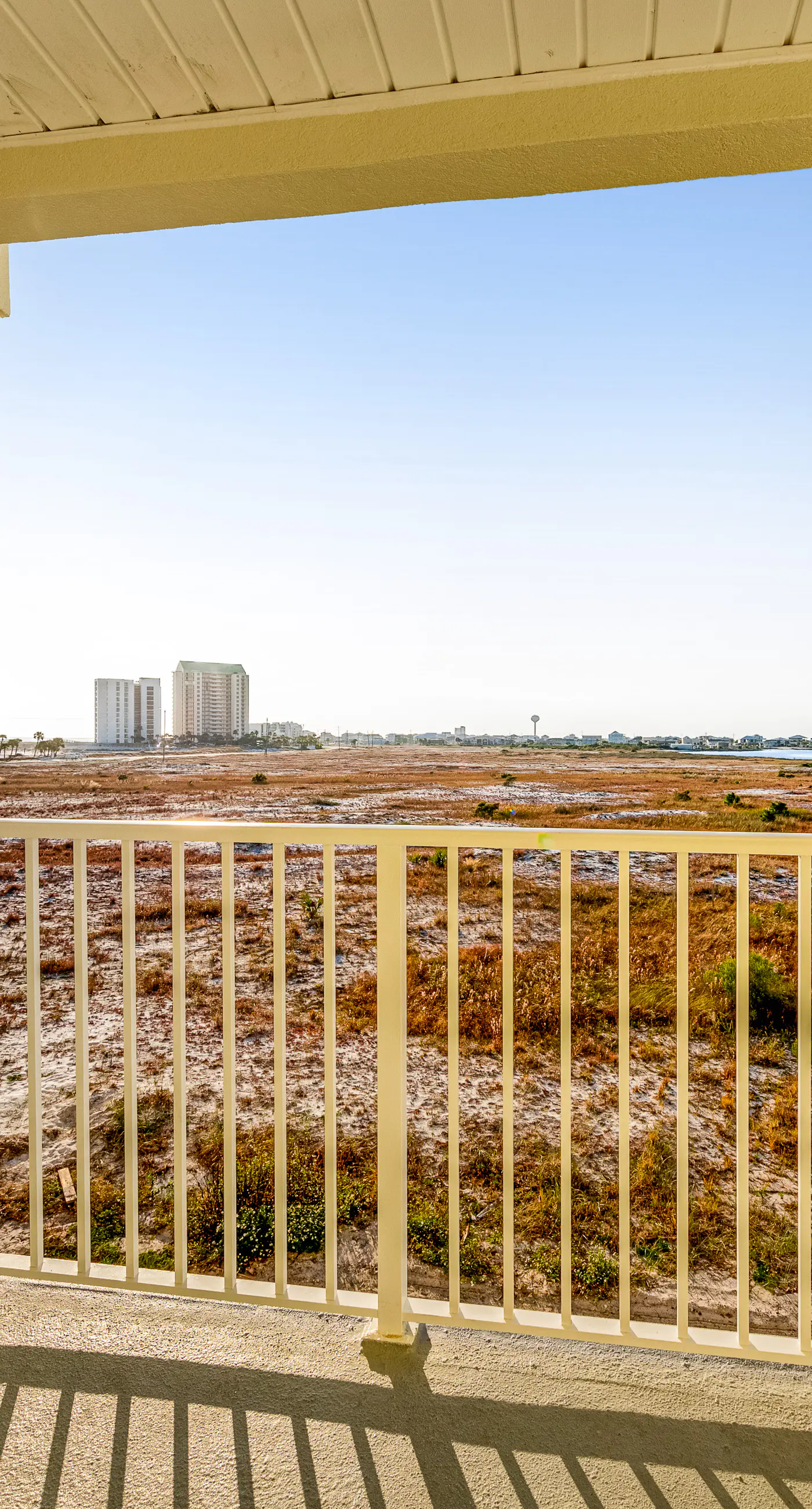 Sunny beachside condo with pool, central AC & washer&dryer