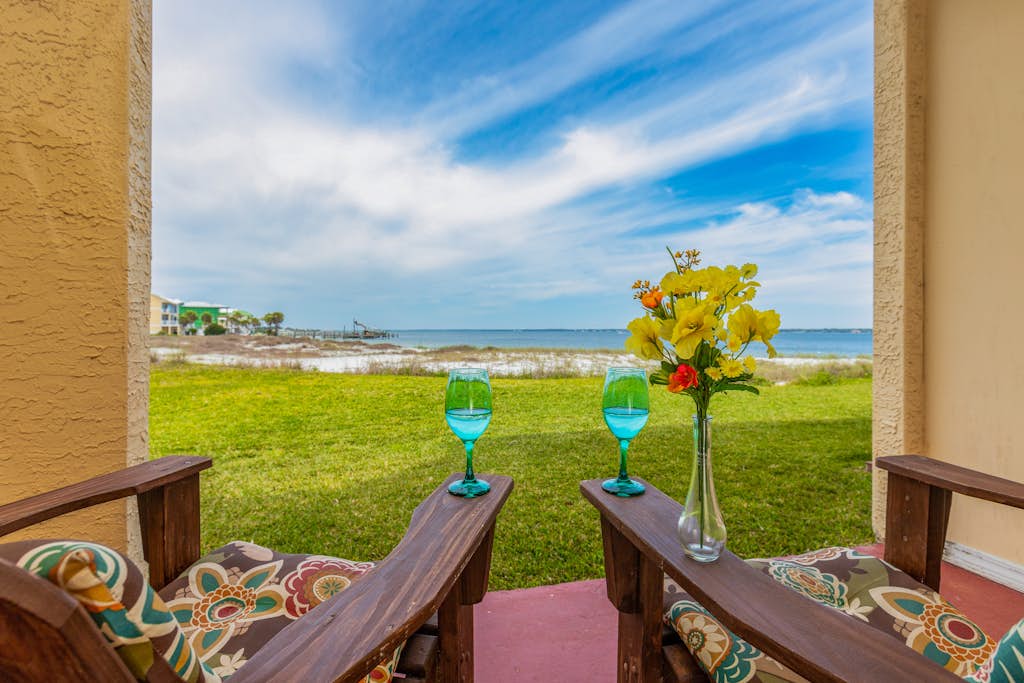 Condo with private balcony, pool, grills, central AC, & W/D