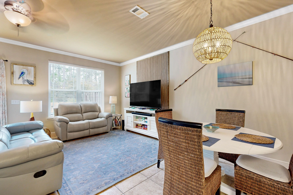 Inviting, two-story home with furnished patio, washer/dryer, & pool access