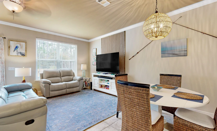 Inviting, two-story home with furnished patio, washer/dryer, & pool access