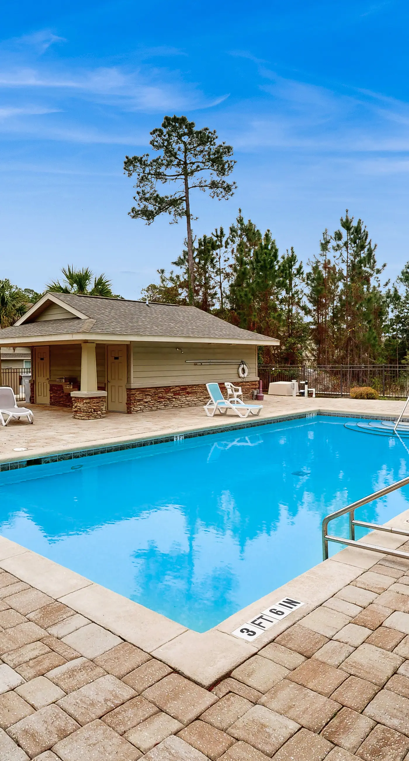 Inviting, two-story home with furnished patio, washer/dryer, & pool access