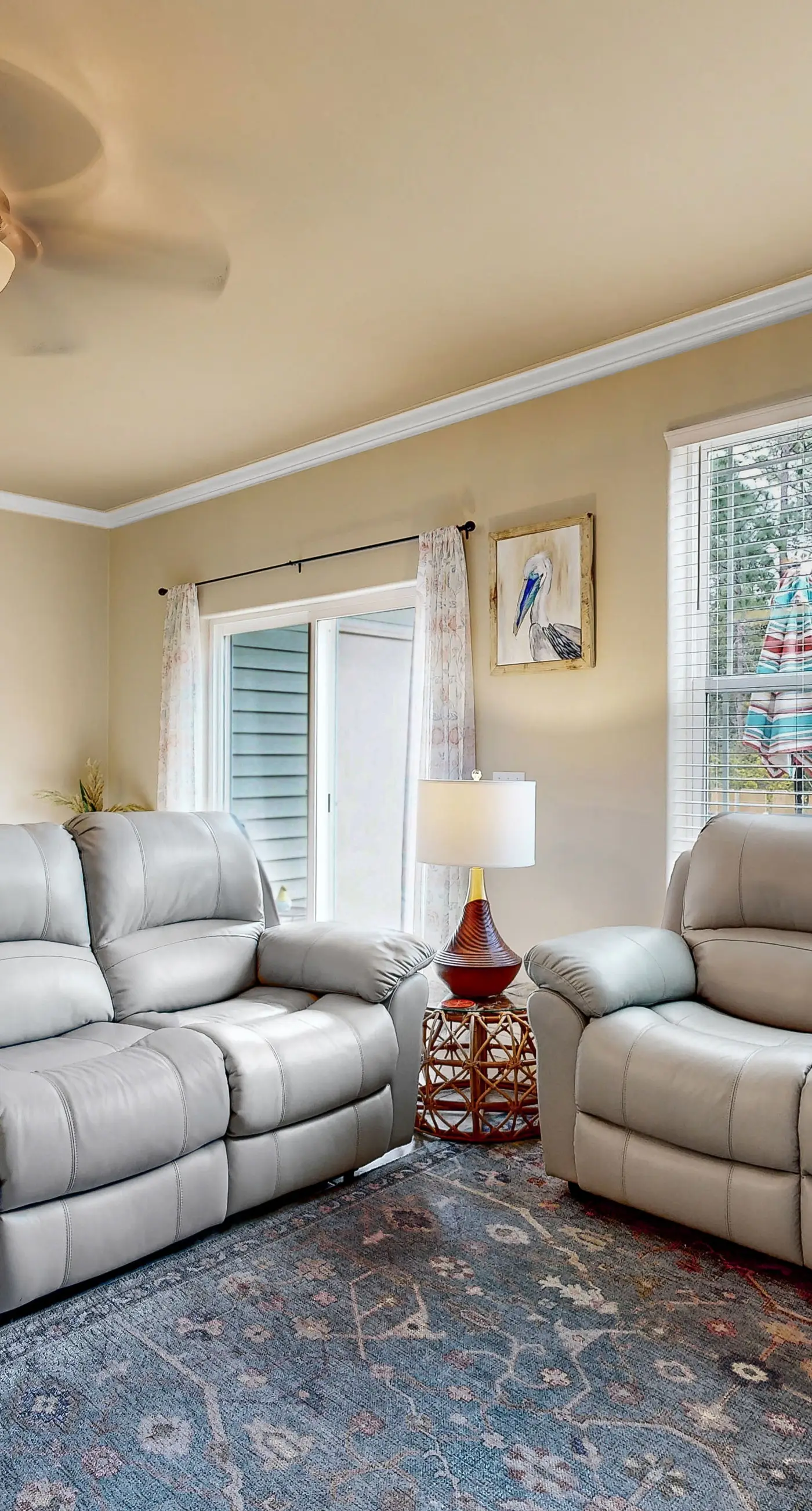 Inviting, two-story home with furnished patio, washer/dryer, & pool access