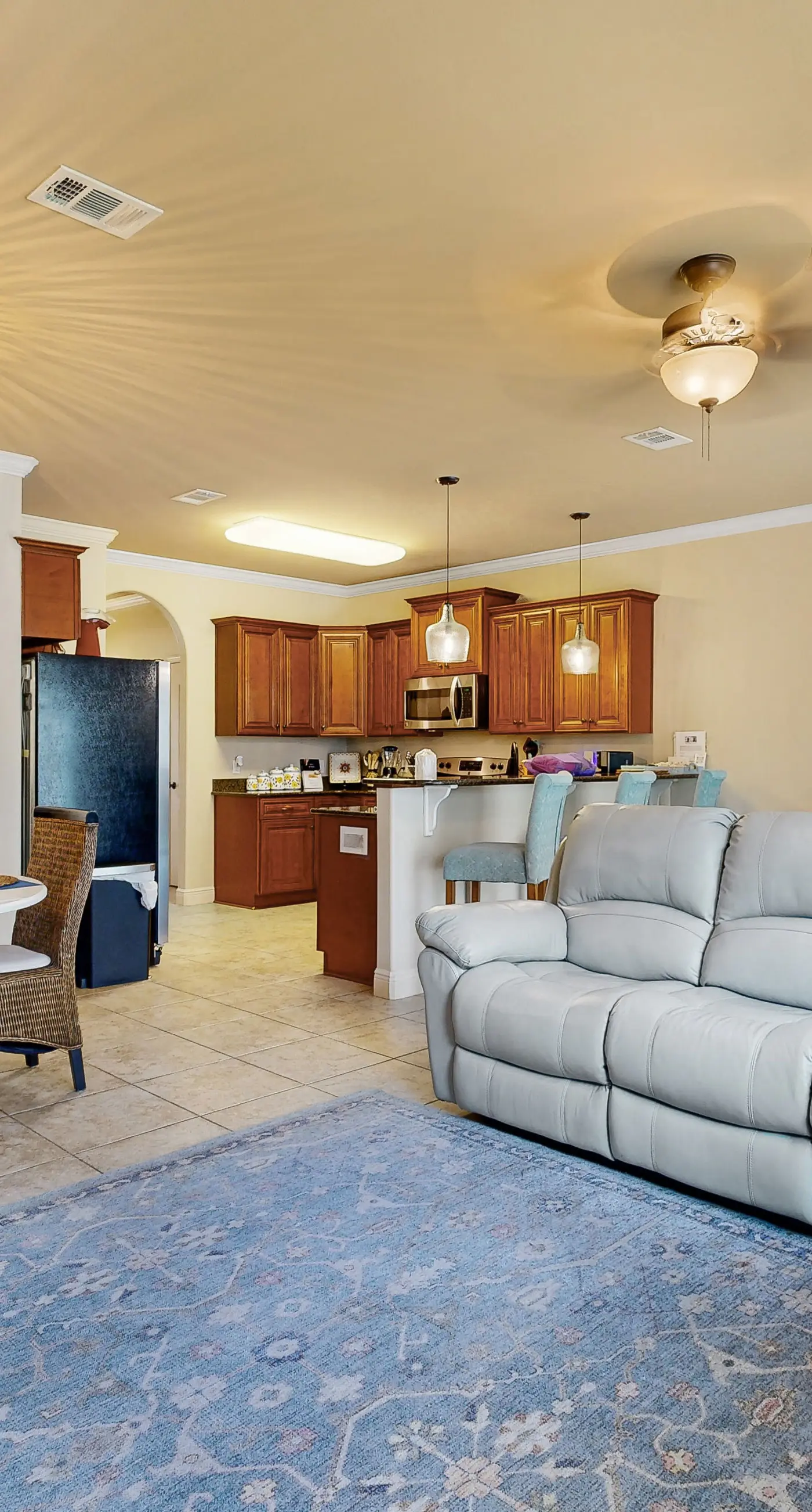 Inviting, two-story home with furnished patio, washer/dryer, & pool access