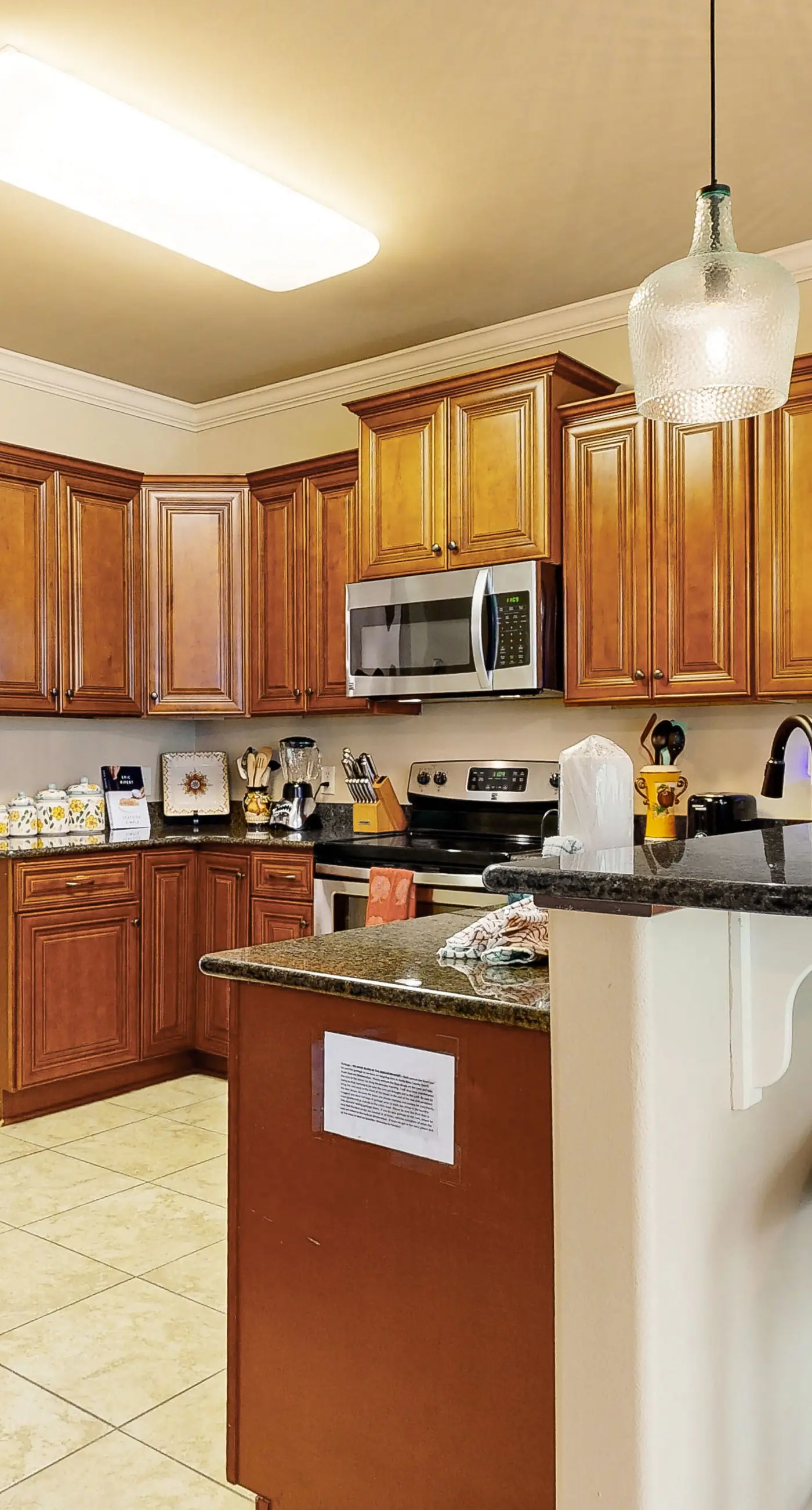 Inviting, two-story home with furnished patio, washer/dryer, & pool access