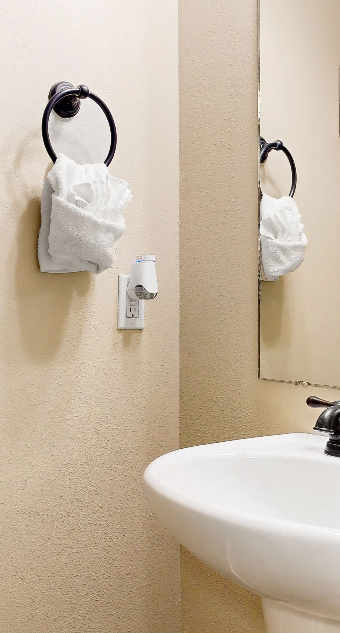 Inviting, two-story home with furnished patio, washer/dryer, & pool access