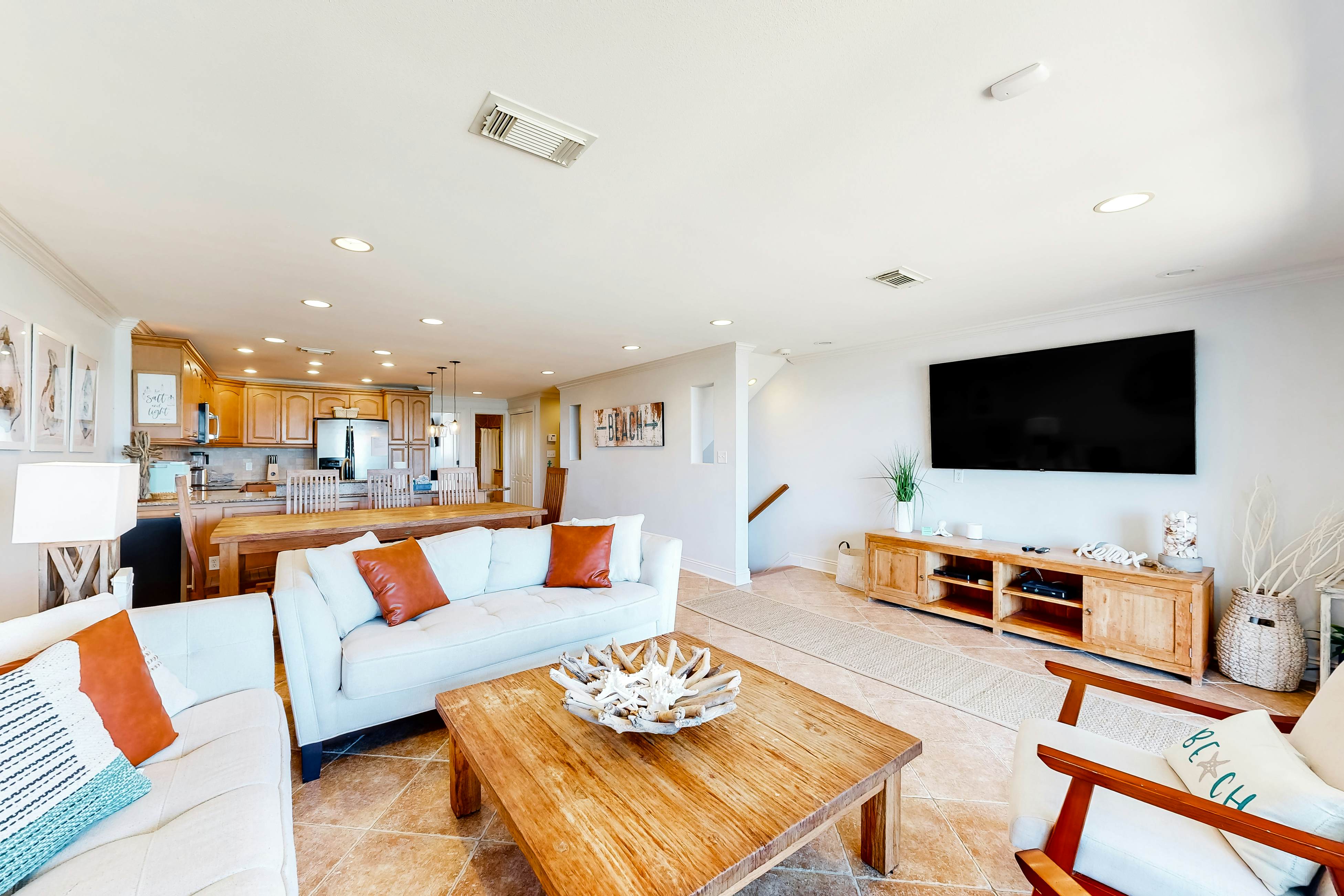 Three-Story Beachfront Gem w/ a Private Balcony, Ocean View, & Full Kitchen