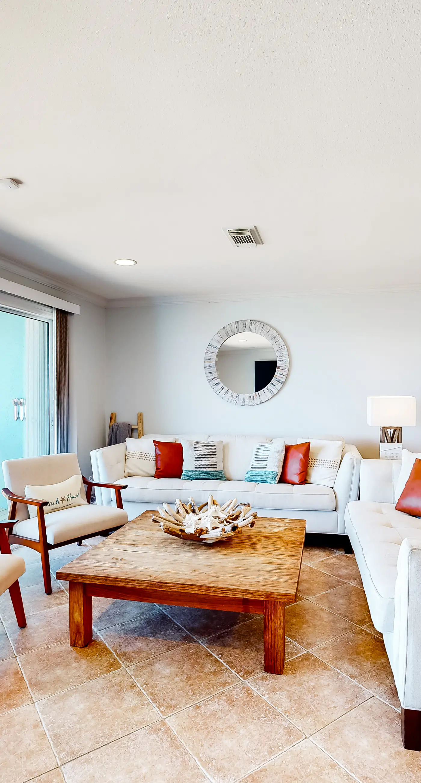 Three-Story Beachfront Gem with a Private Balcony, Ocean View, & Full Kitchen