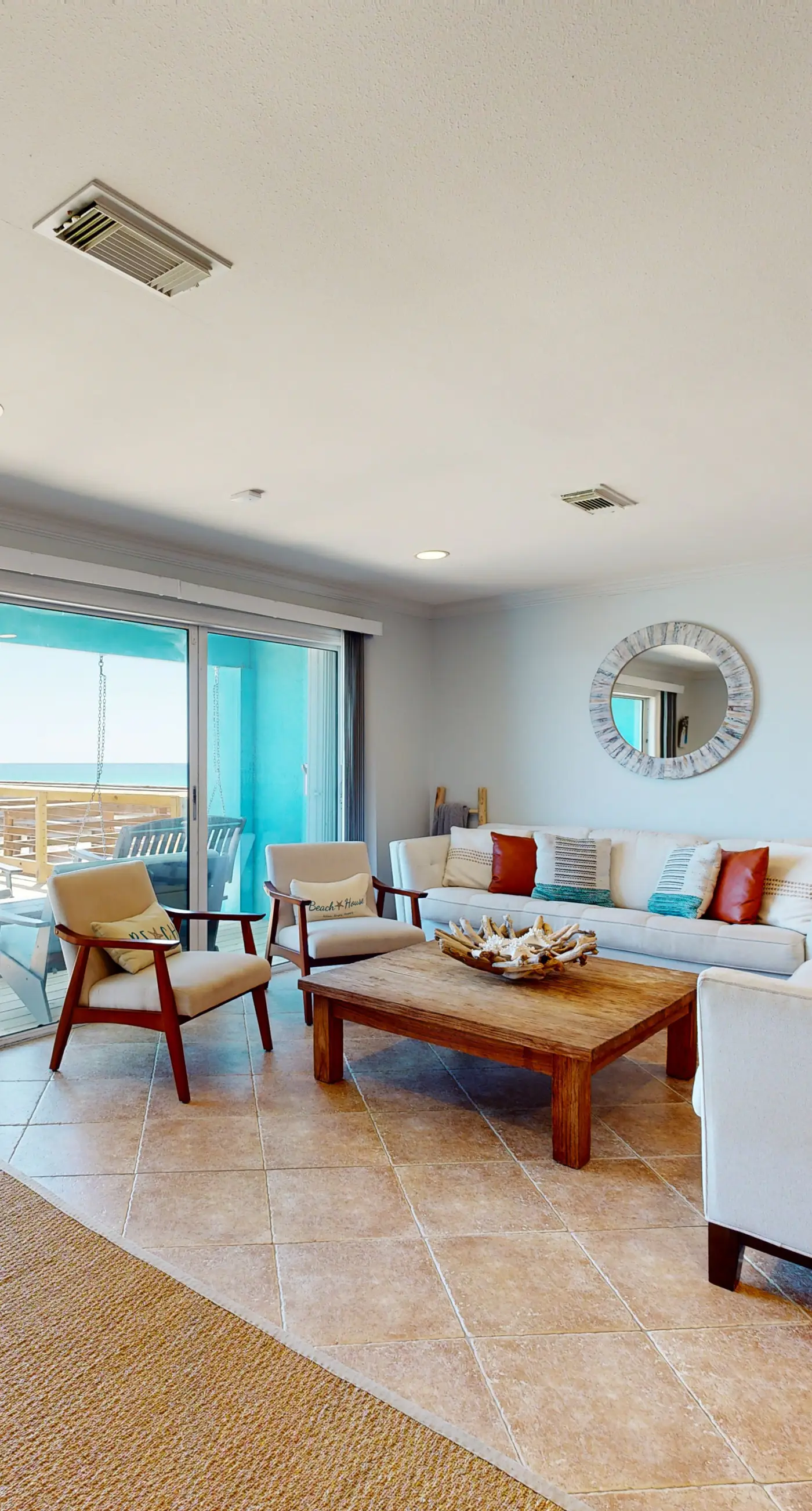 Three-Story Beachfront Gem with a Private Balcony, Ocean View, & Full Kitchen
