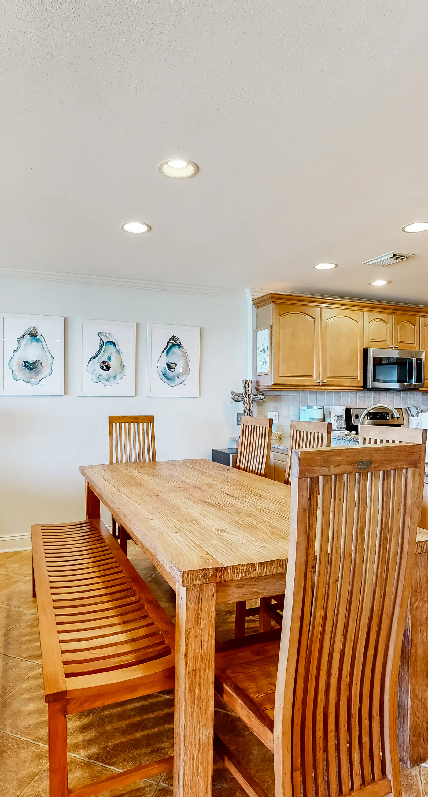 Three-Story Beachfront Gem with a Private Balcony, Ocean View, & Full Kitchen
