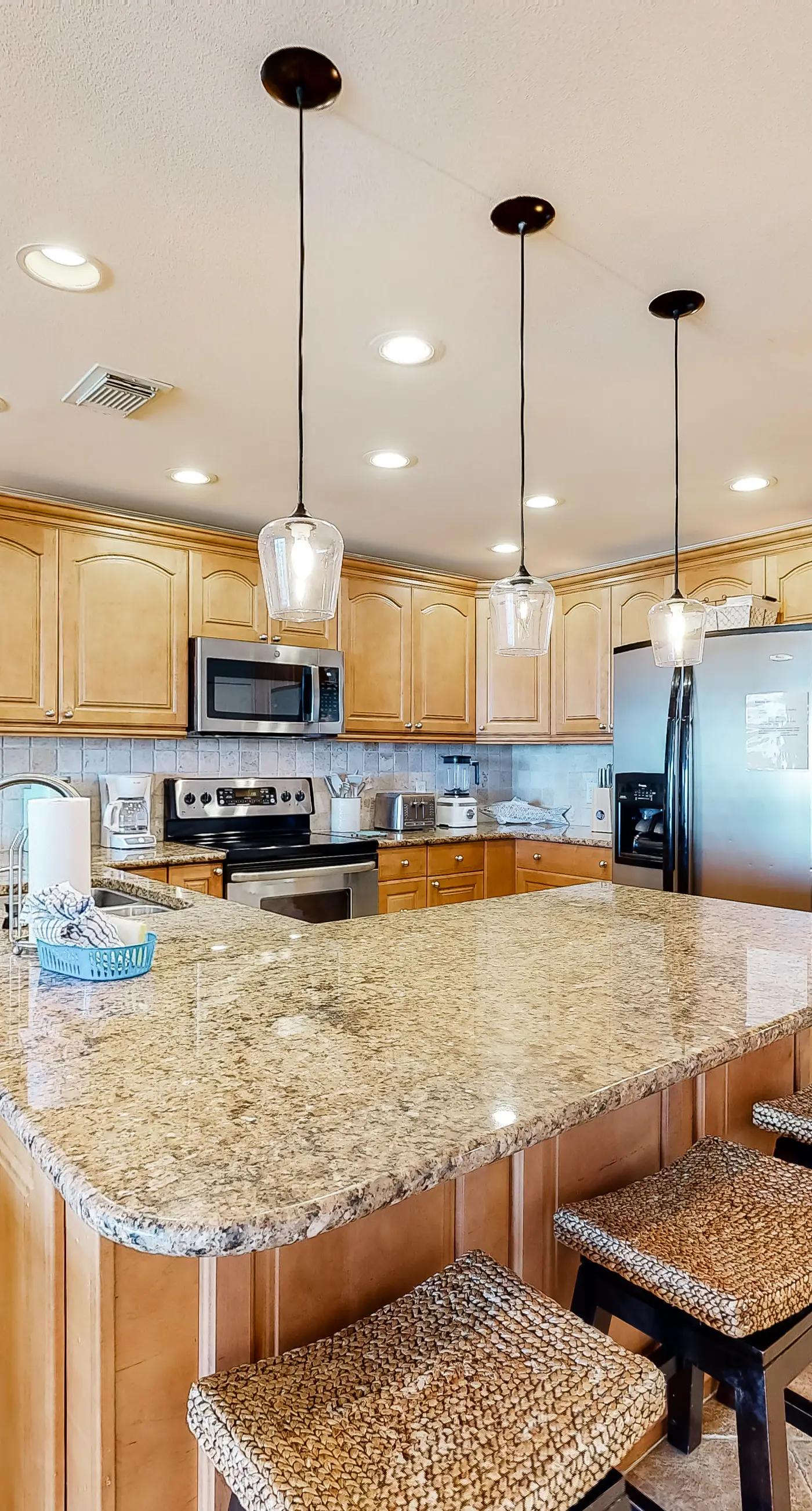 Three-Story Beachfront Gem with a Private Balcony, Ocean View, & Full Kitchen