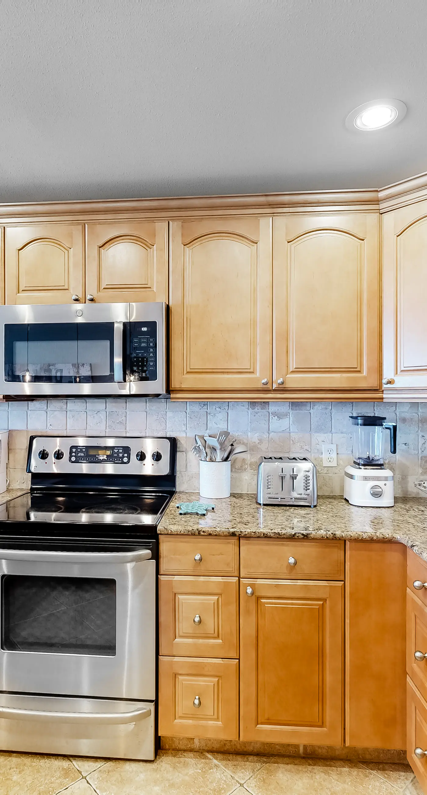 Three-Story Beachfront Gem with a Private Balcony, Ocean View, & Full Kitchen