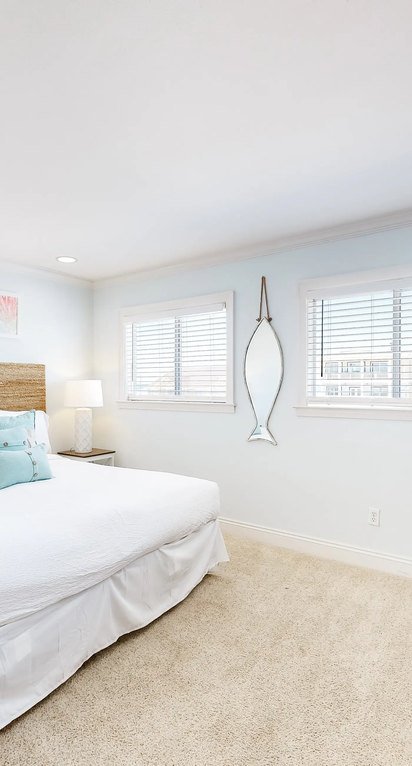 Three-Story Beachfront Gem with a Private Balcony, Ocean View, & Full Kitchen