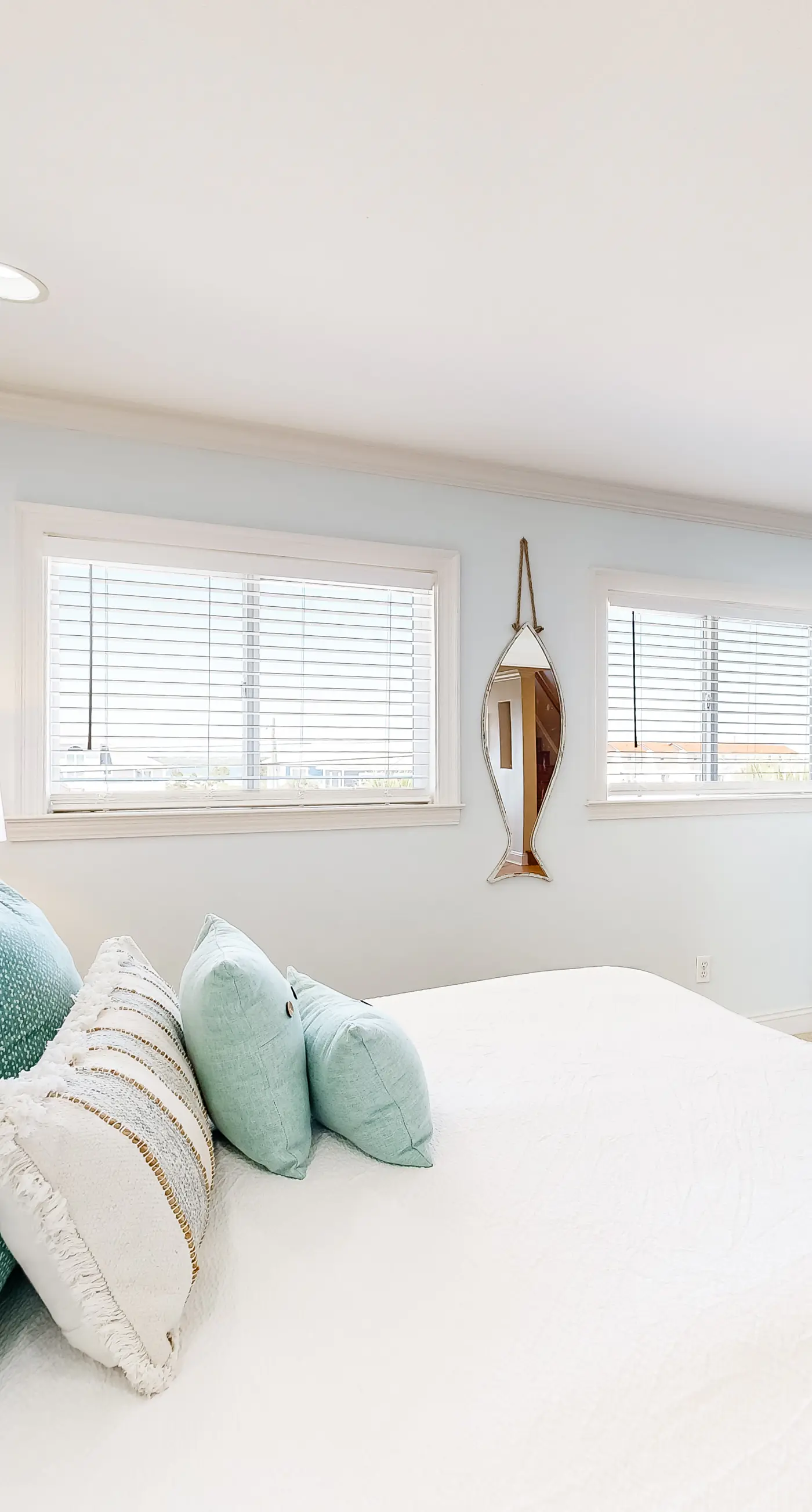 Three-Story Beachfront Gem with a Private Balcony, Ocean View, & Full Kitchen