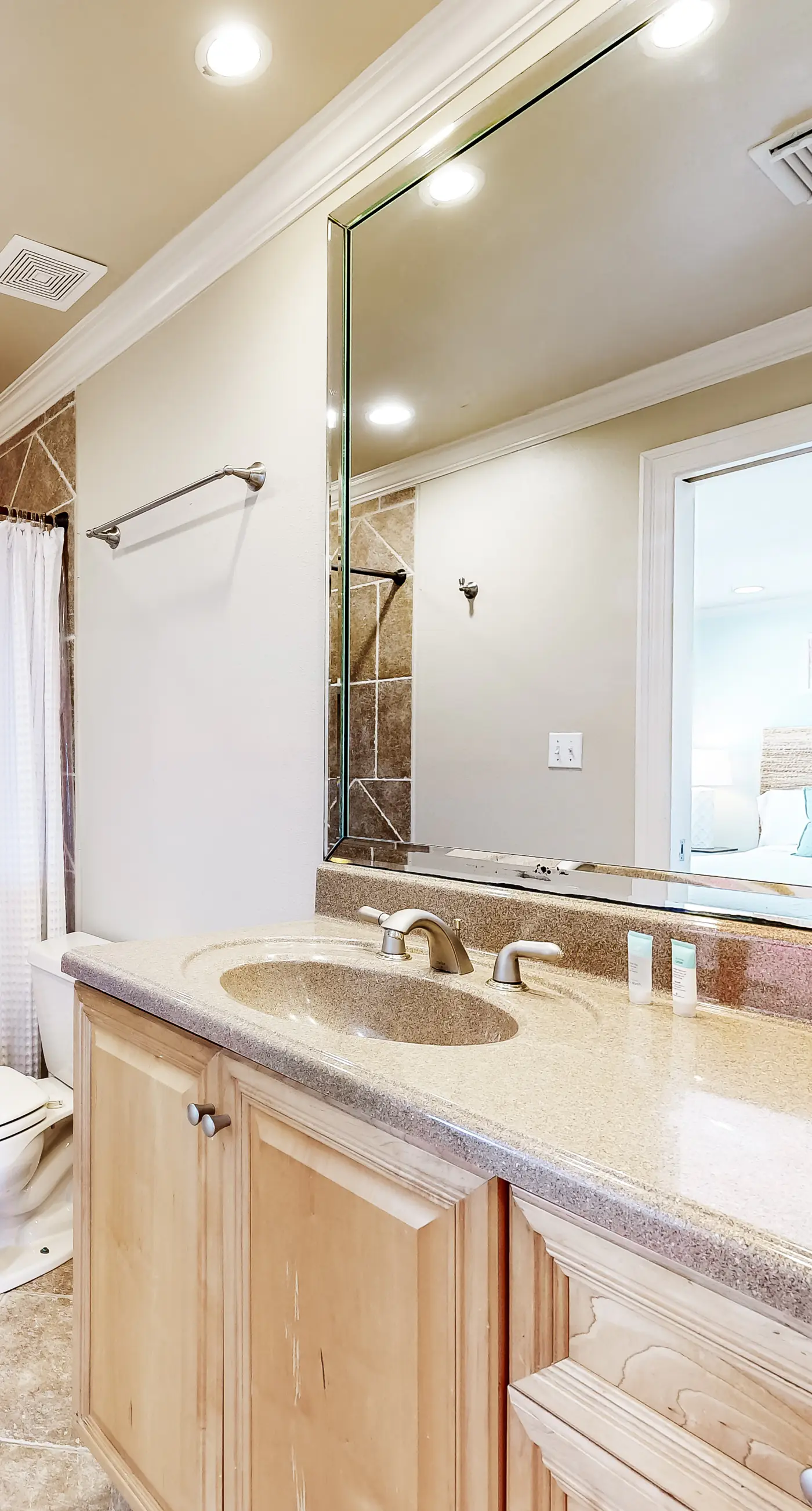 Three-Story Beachfront Gem with a Private Balcony, Ocean View, & Full Kitchen