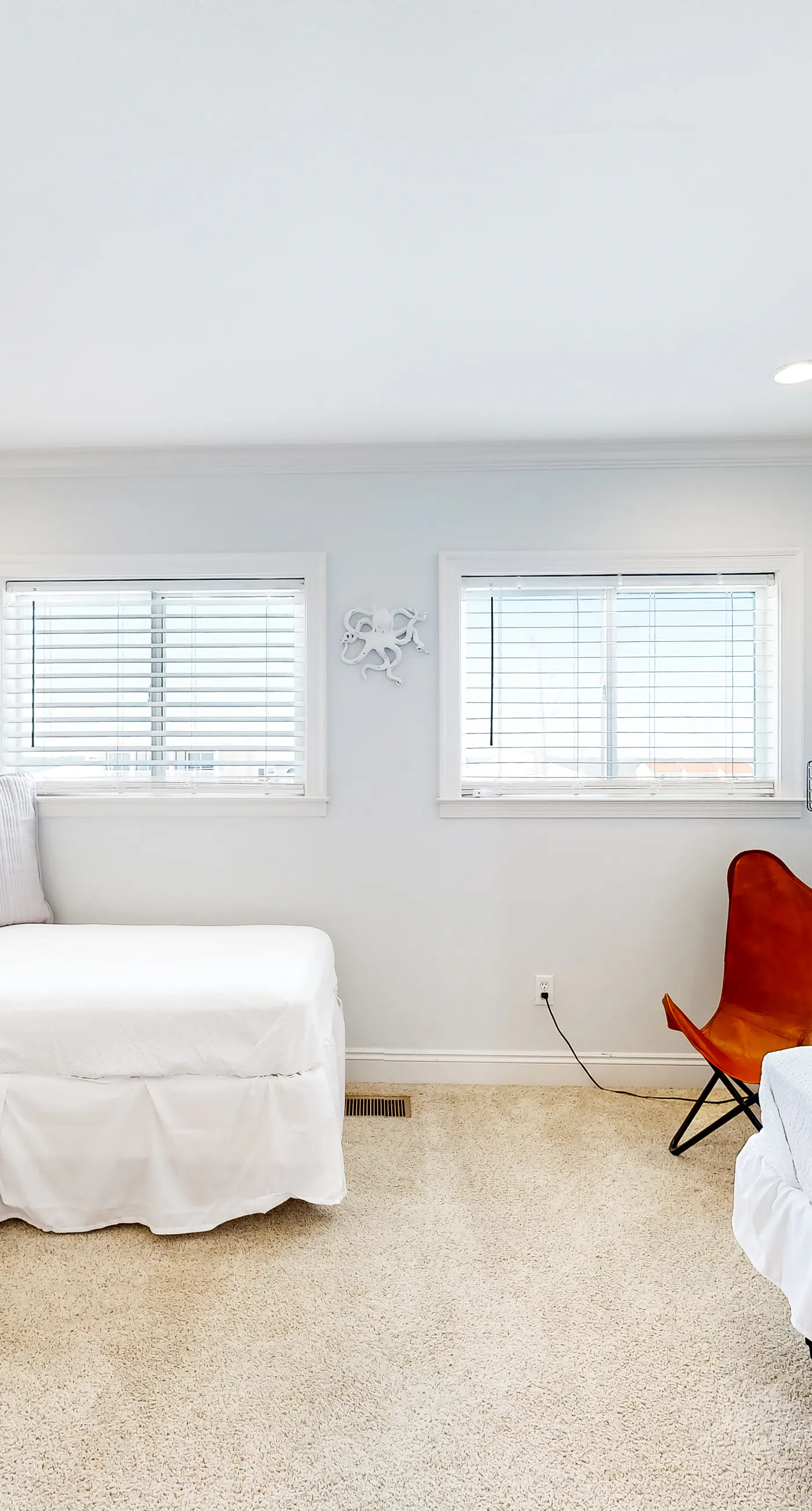 Three-Story Beachfront Gem with a Private Balcony, Ocean View, & Full Kitchen