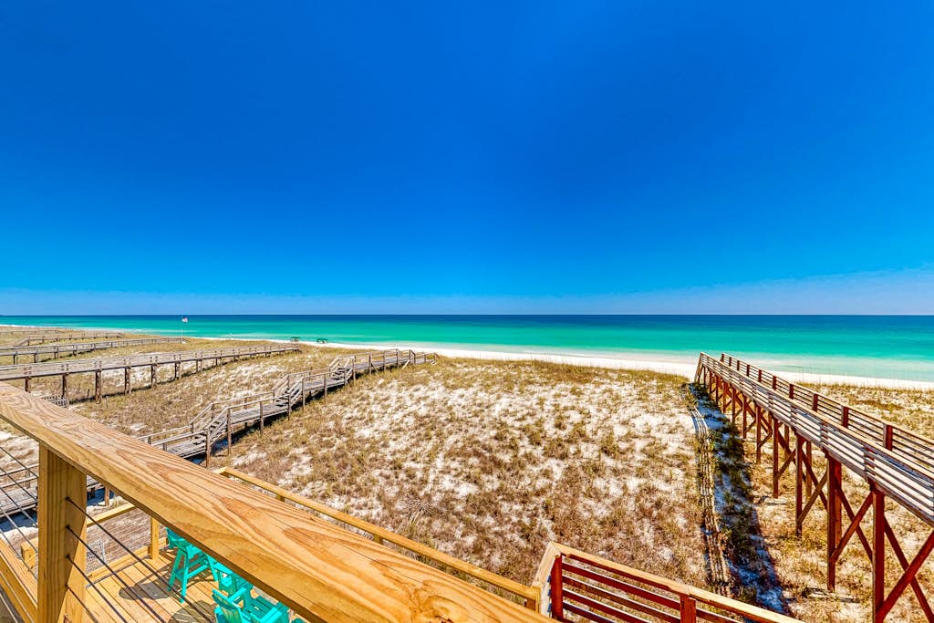 Three-Story Beachfront Gem w/ a Private Balcony, Ocean View, & Full Kitchen