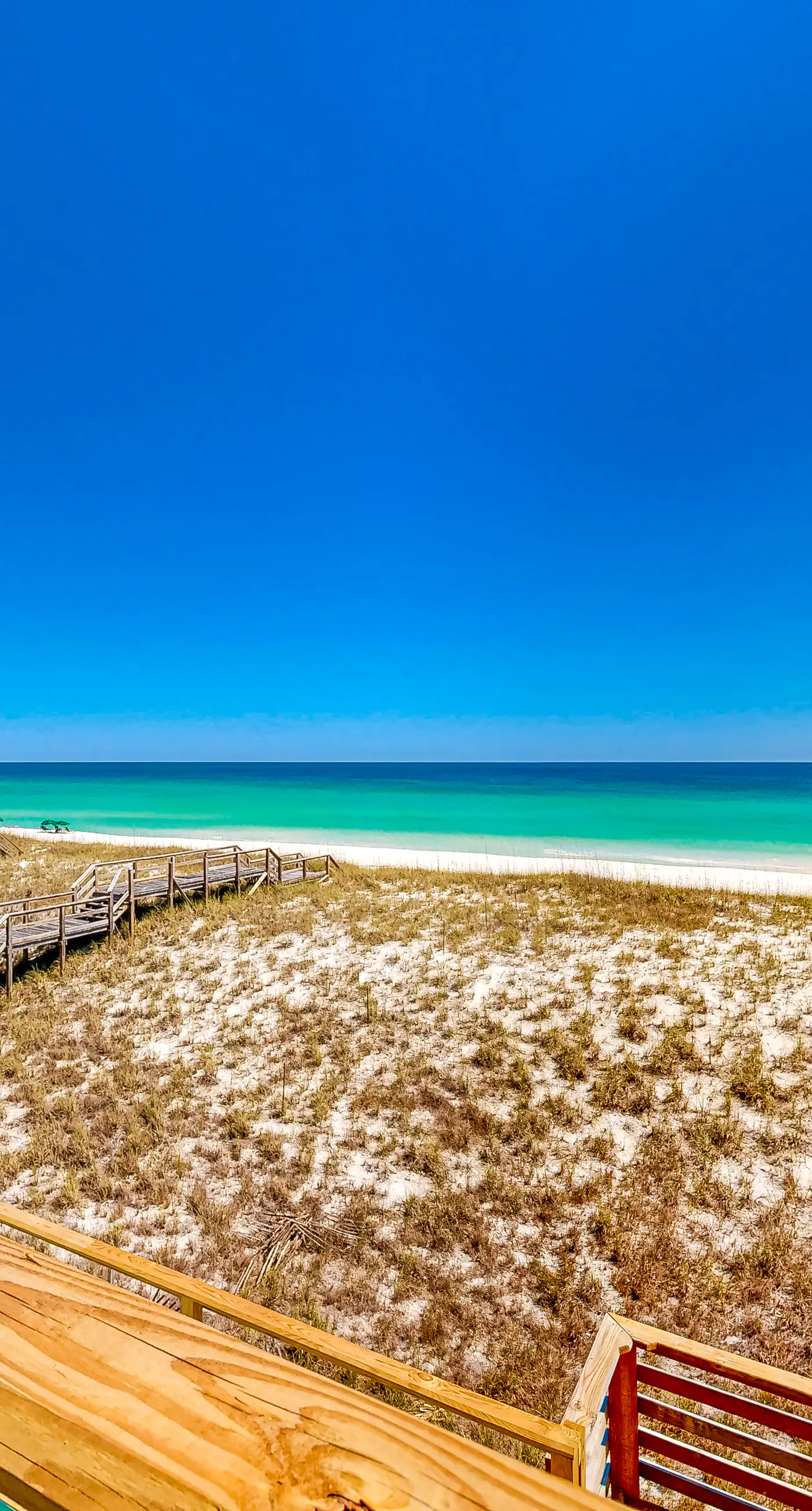 Three-Story Beachfront Gem with a Private Balcony, Ocean View, & Full Kitchen