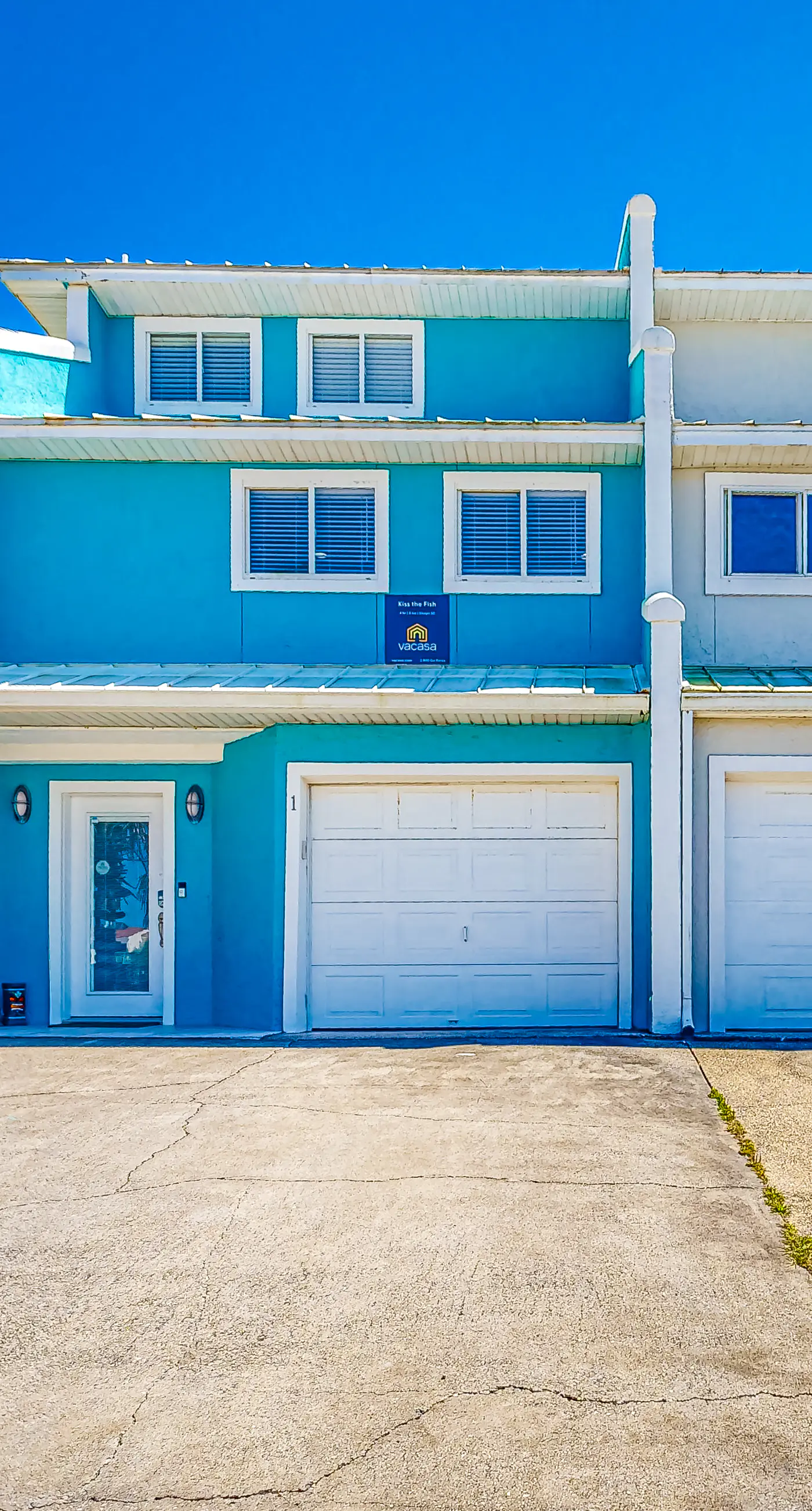 Three-Story Beachfront Gem with a Private Balcony, Ocean View, & Full Kitchen