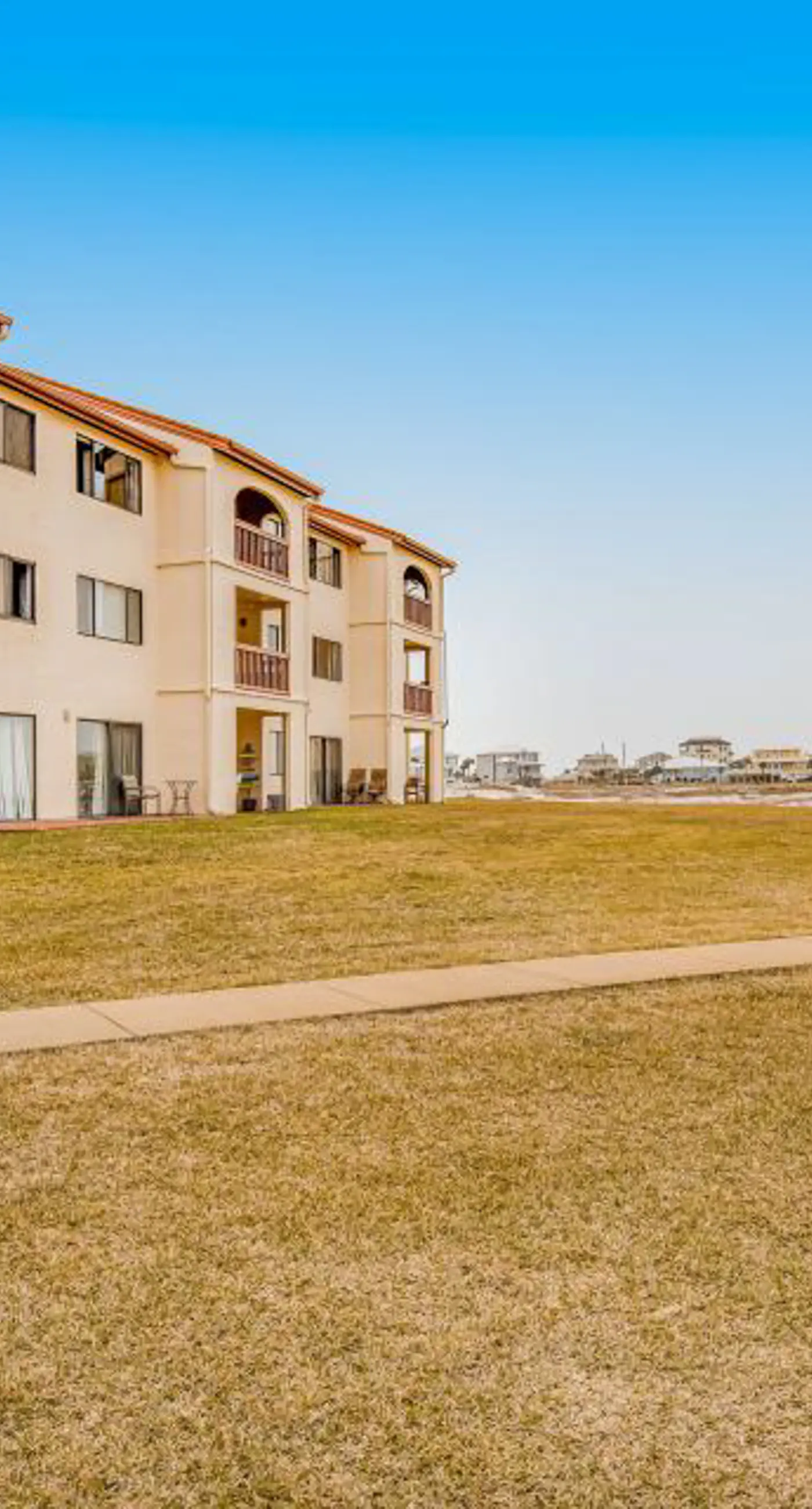 Ground-Floor Condo near the Beach w/Private W/D, A/C, Shared Outdoor Pool