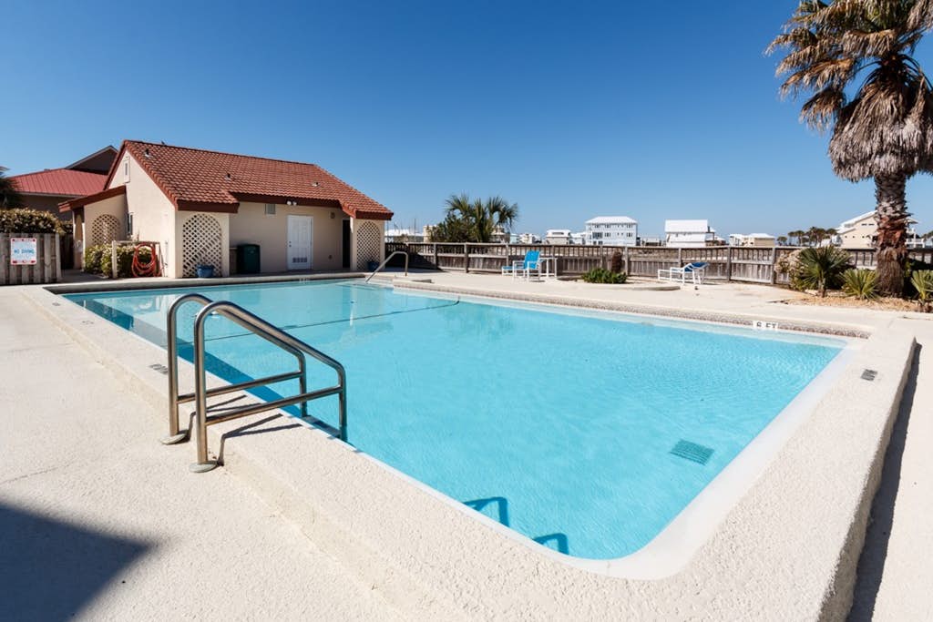 Studio with a patio, pool access, and central AC - snowbird friendly