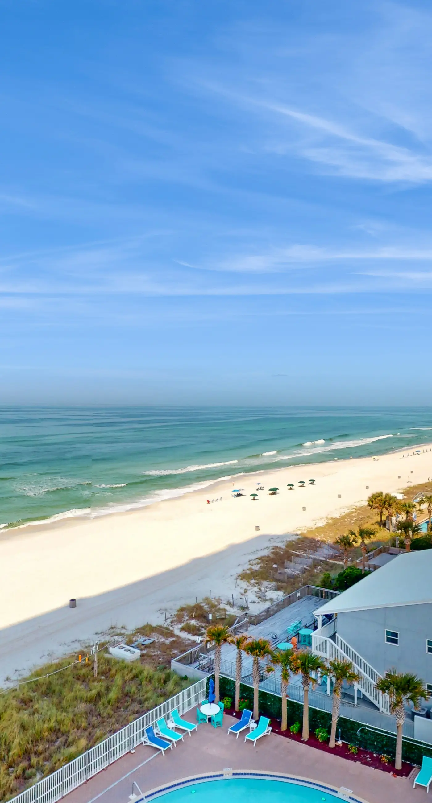 Lovely condo at beachfront resort with sunset views, pools, hot tubs, & gym