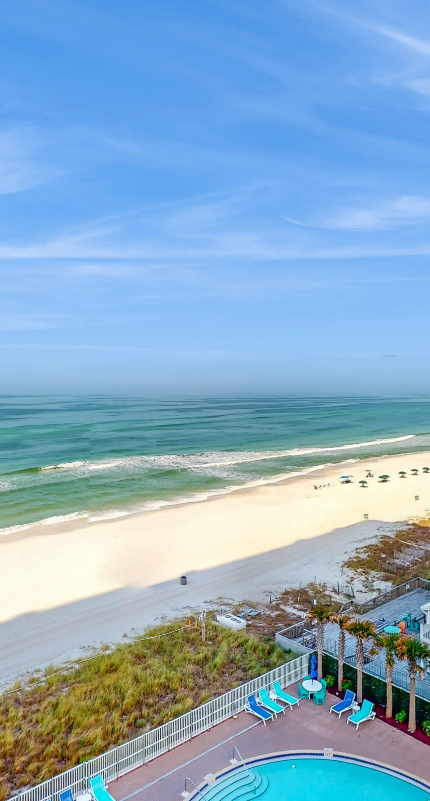 Lovely condo at beachfront resort with sunset views, pools, hot tubs, & gym